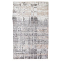 Alfombra moderna abstracta de lana tibetana en gris y beige