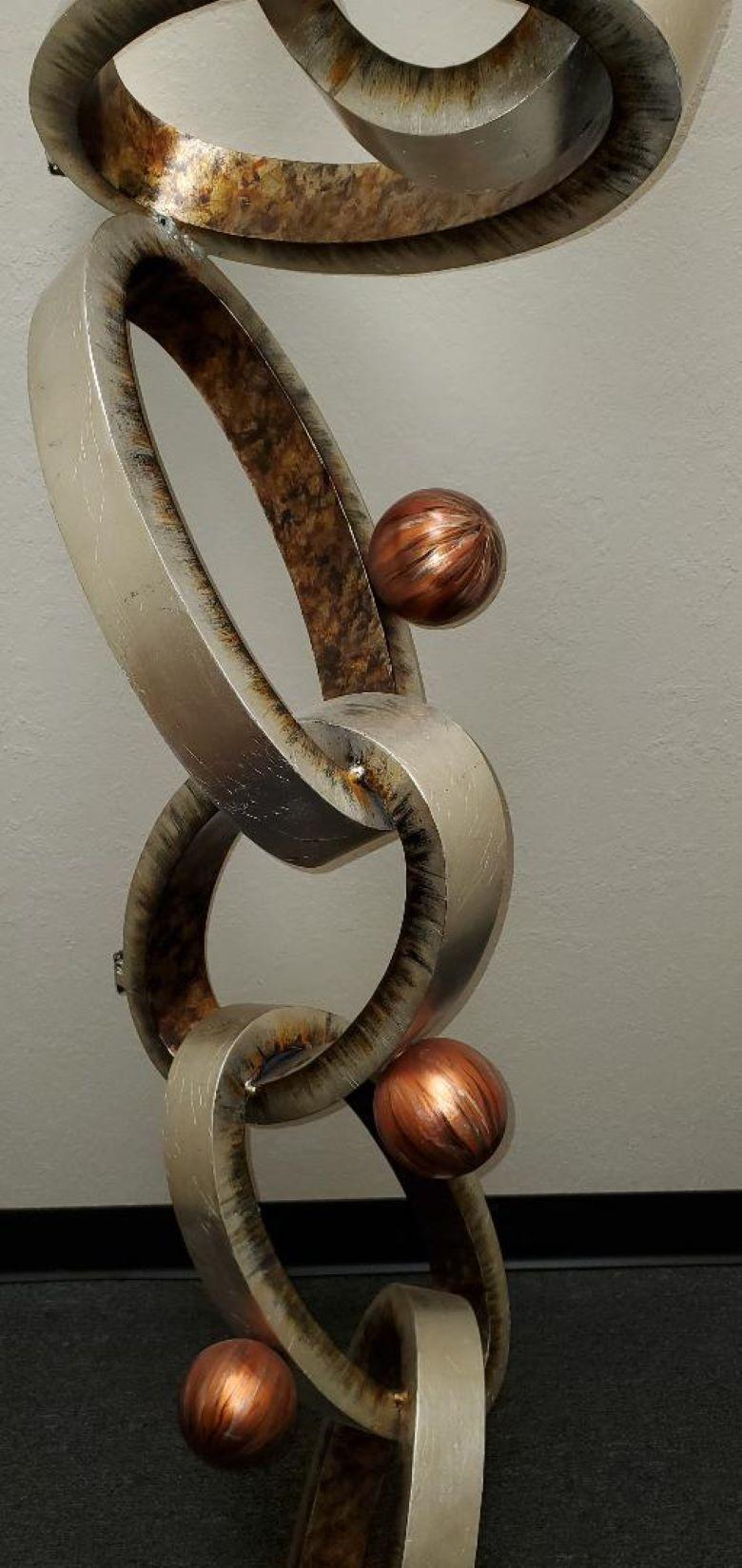 Bronzed Abstract Modern Wall Art Sculpture of Interlocking Metal Ovals & Spheres For Sale