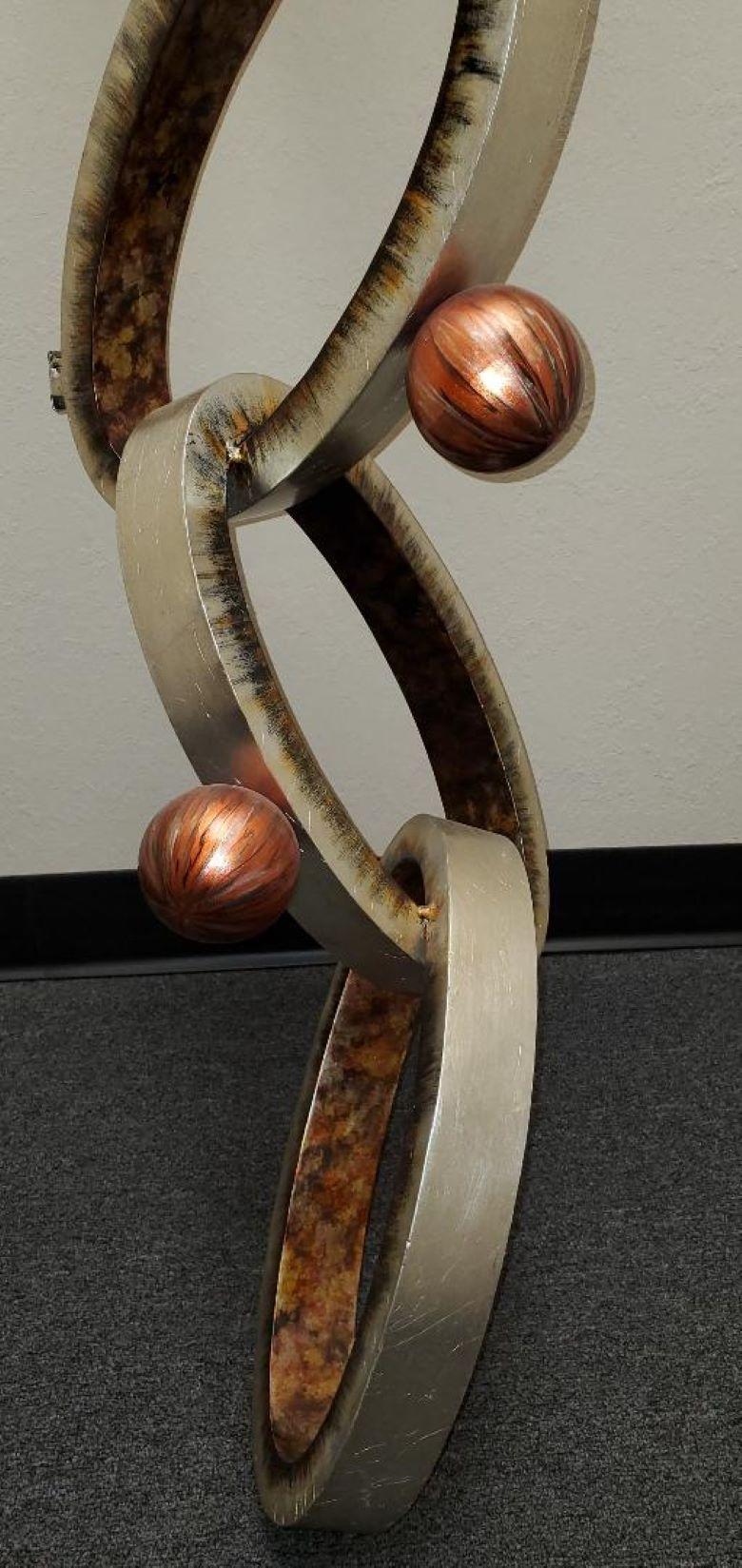 Abstract Modern Wall Art Sculpture of Interlocking Metal Ovals & Spheres In Good Condition For Sale In Monrovia, CA