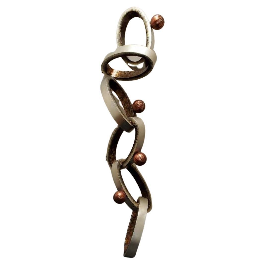 Abstract Modern Wall Art Sculpture of Interlocking Metal Ovals & Spheres For Sale