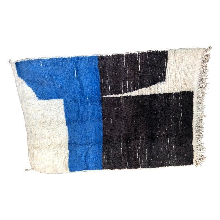 A Berber Abstract rug woven by hand in the high Atlas Mountains of Morocco. Chosen for its abstract style and homage to Modern Art. A one-of-a-kind piece which can be used as a rug or a wall hanging. Referencing Modernist style where the modern,