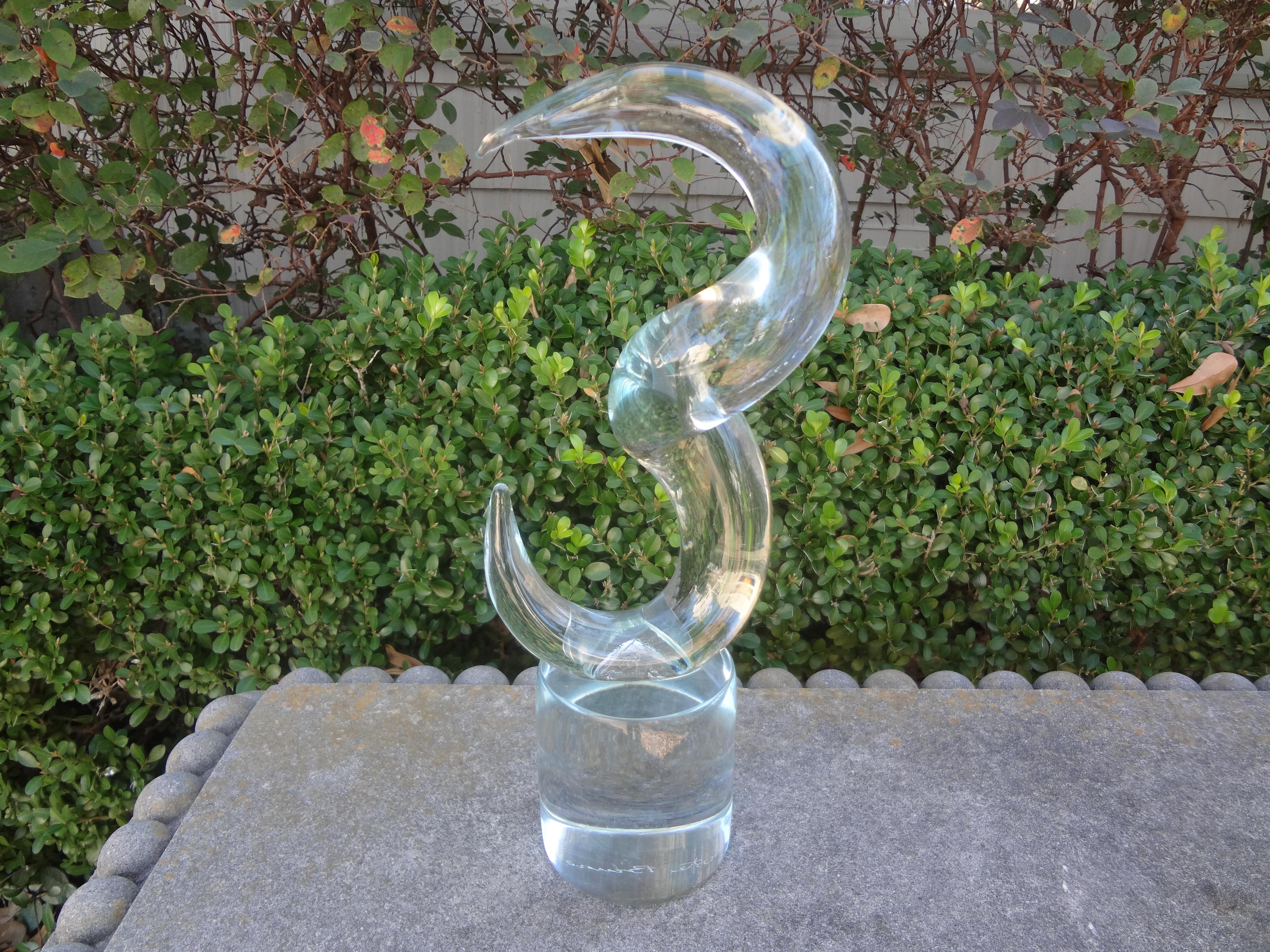 Abstract Modernist glass sculpture signed d'Este Bruno. This interesting 20th century glass table sculpture would make a great cocktail or bookcase accessory.
Stunning!