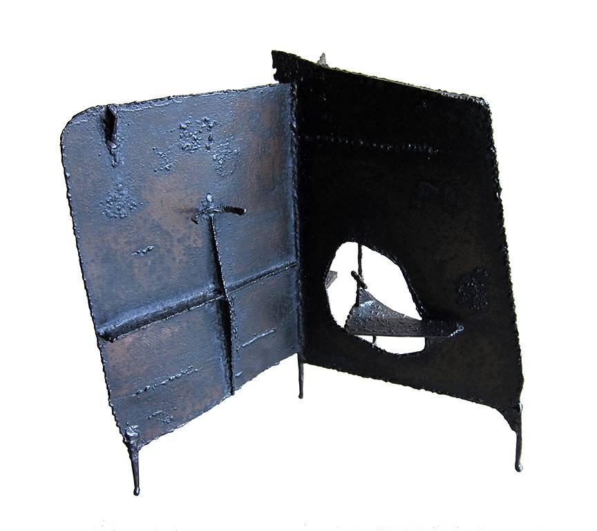 Three-sided oxidized iron abstract sculpture, circa 1960s. Sculpture measures 23