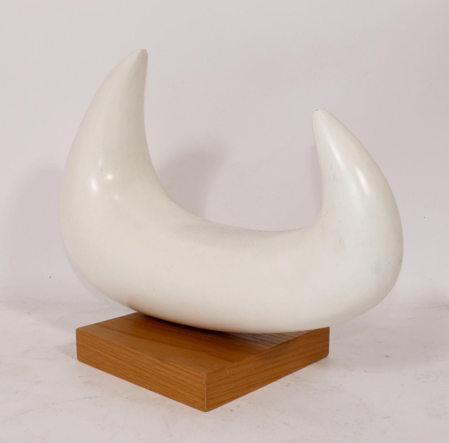 Abstract Modernist Sculpture, American, circa 1960s. Believed to constructed of plaster or resin on a natural wood base.