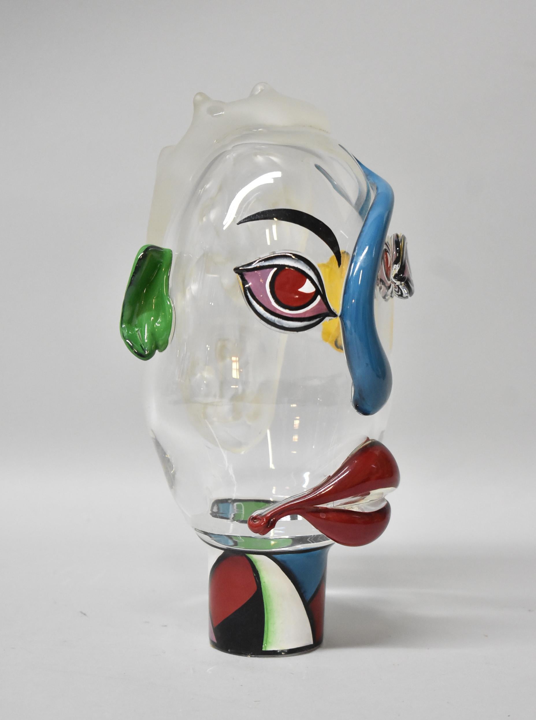 Abstract art glass Picasso style figural face with dramatic colorful features. Applied frosted hair. Very good condition.