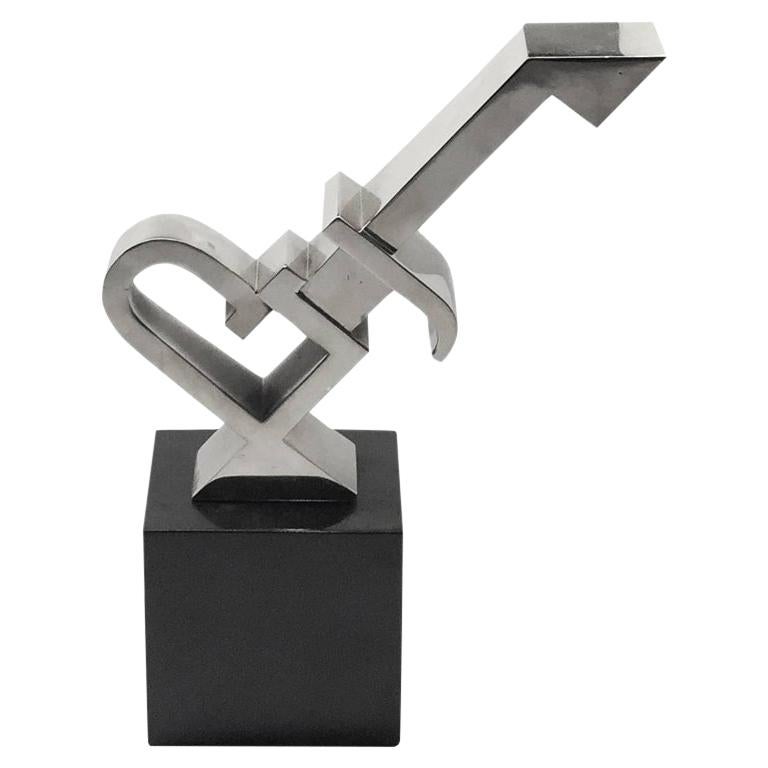 Abstract Nickel Sculpture on Black Marble Base For Sale