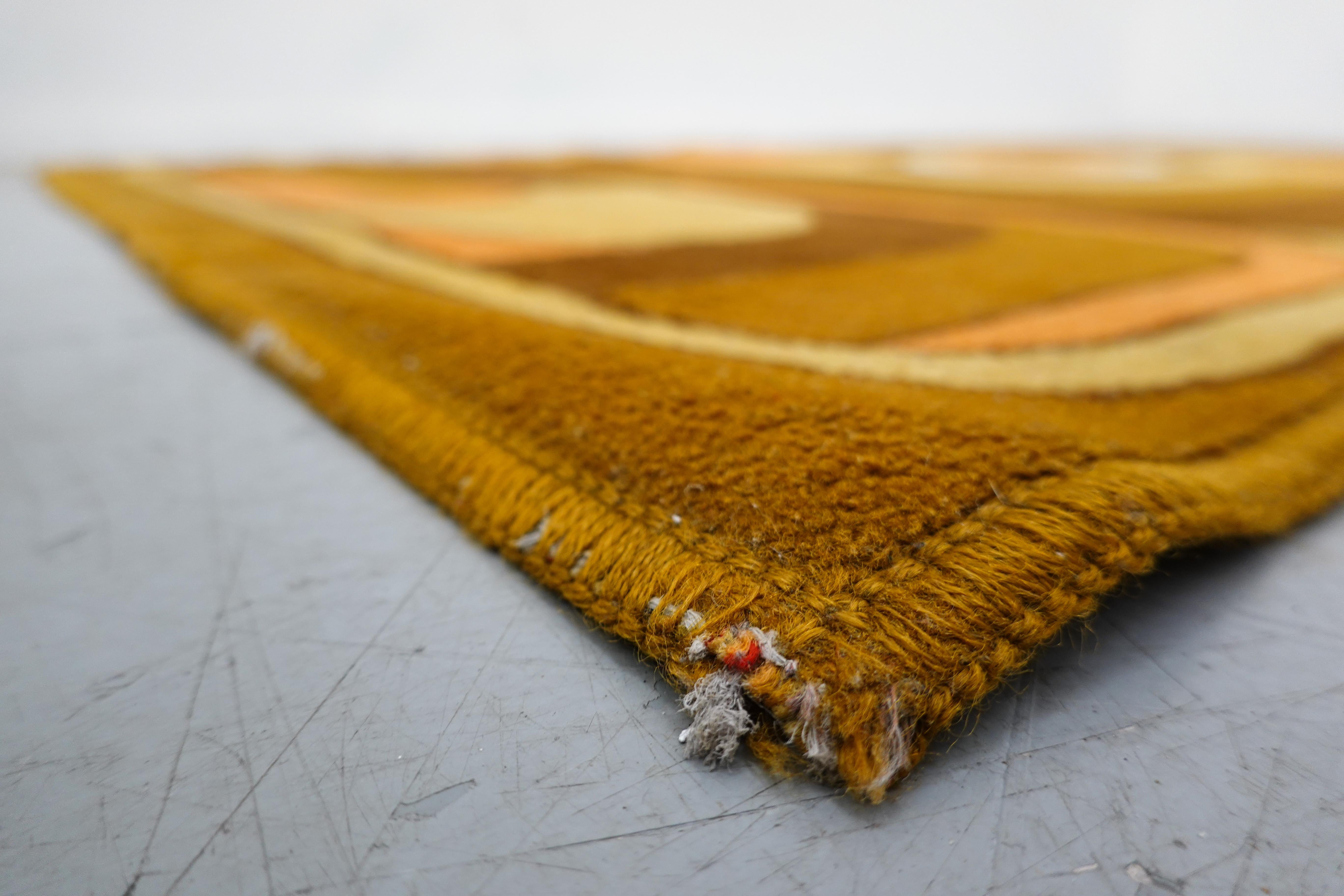 Abstract orange, yellow and brown wool carpet, 1970s.