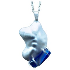 Abstract Organic Repoussé Silver Contour Pendant with Cobalt Blue Glass