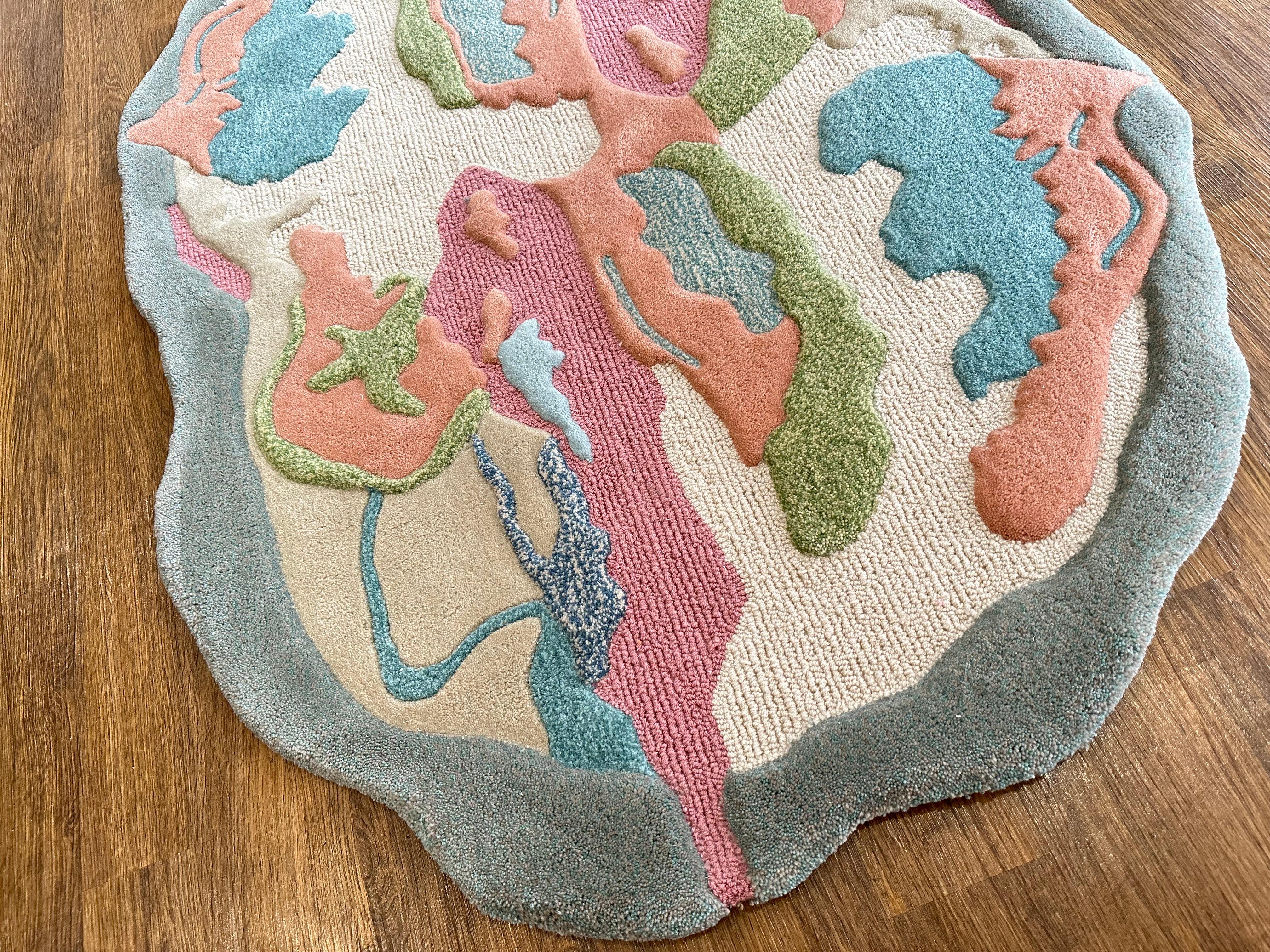 Just in a gooey-shaped, slimy pastel goodness cheekily tucked into an abstract, squiggly oval rug-a fresh addition to RAG Home's playful rug lineup.

Custom in size and color.