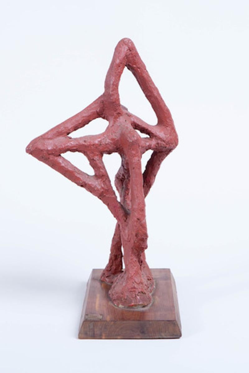 Abstract, terracotta red painted plaster sculpture on wood base. Signed with a hand-hammered copper plaque. Most likely made in the 1960s by an unknown artist.
 