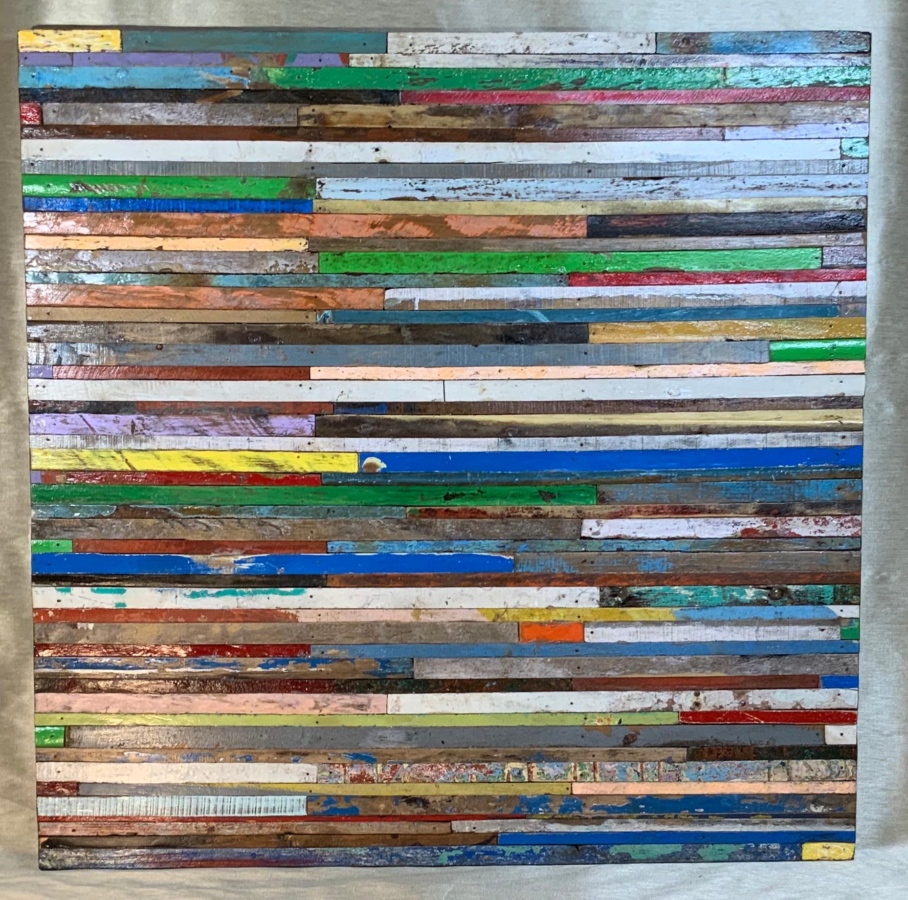 Exceptional wall hanging wood sculpture made of multi-colors reclaimed wood strips cuts, to put together beautiful mosaic of colors
By this unknown artist.
Could be use horizontal or vertical.