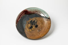 abstract red black and brown stoneware ceramic plate by Claire Berger 1980