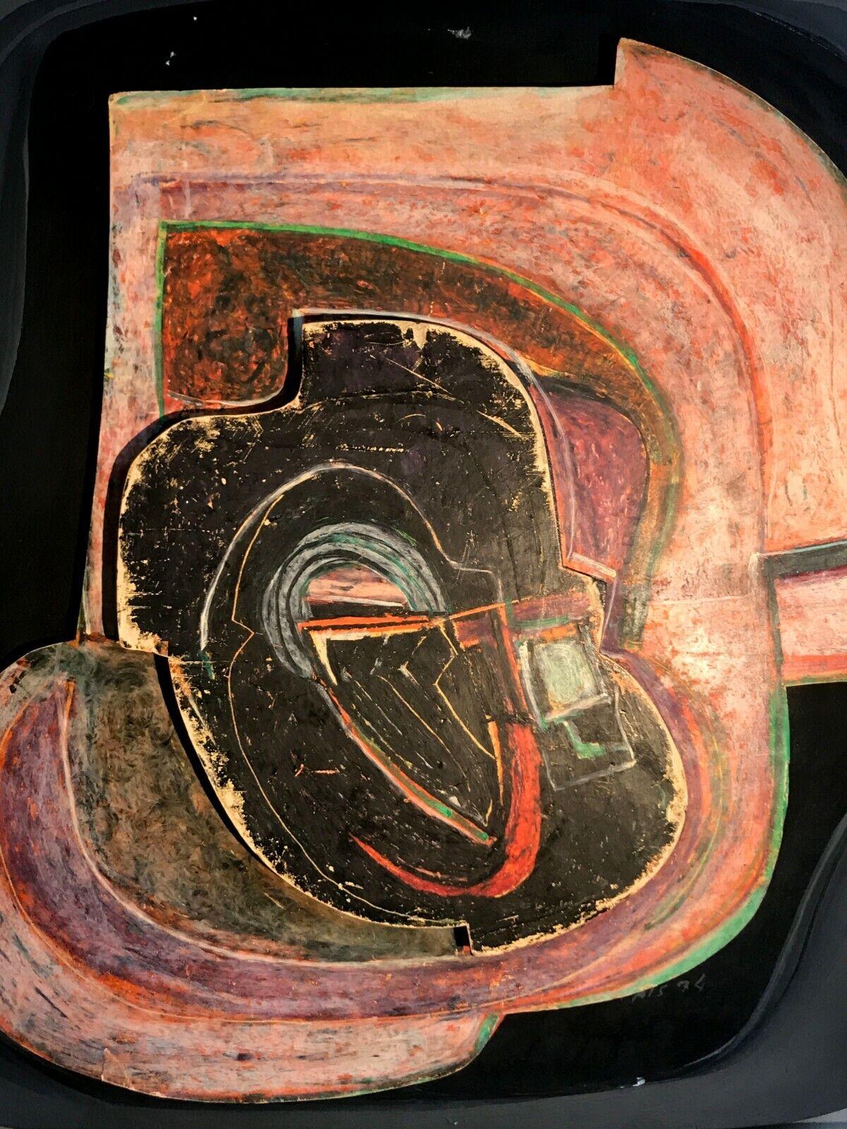 An abstract relief painting, black center, different shades of orange, pink, red, purple around, with a green surrounding line, post-modern, abstract, forme-libre, oil on wooden pannels overlaying one on another, framed in a shadow box, signed Jean
