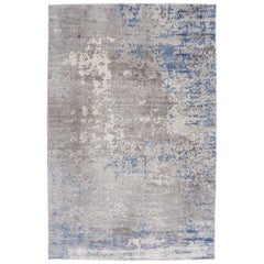 Abstrakter abstrakter Teppich in Grau und Blau