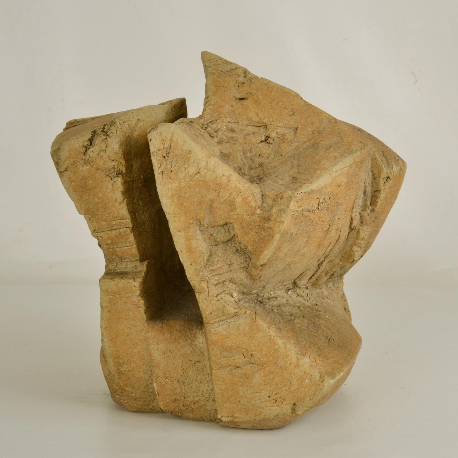 This hand formed ceramic rock sculpture looks like the coastal cliffs on the British coast line. Bryan Blow's work echoes a voyage of discovery in not just the visible natural world of trees, rocks but the city and Industrial landscape with his