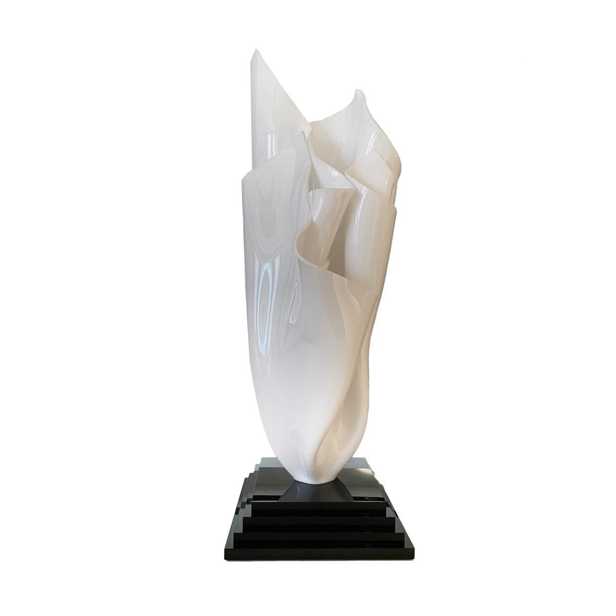 Get drawn into the incredible shape of this Abstract Sculpture that will bring a mid-century vibe to your favorite room! Base is in pure black Polypropylene 