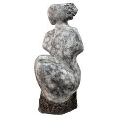 Abstract sculpture of a seated woman, one of a kind, cast
