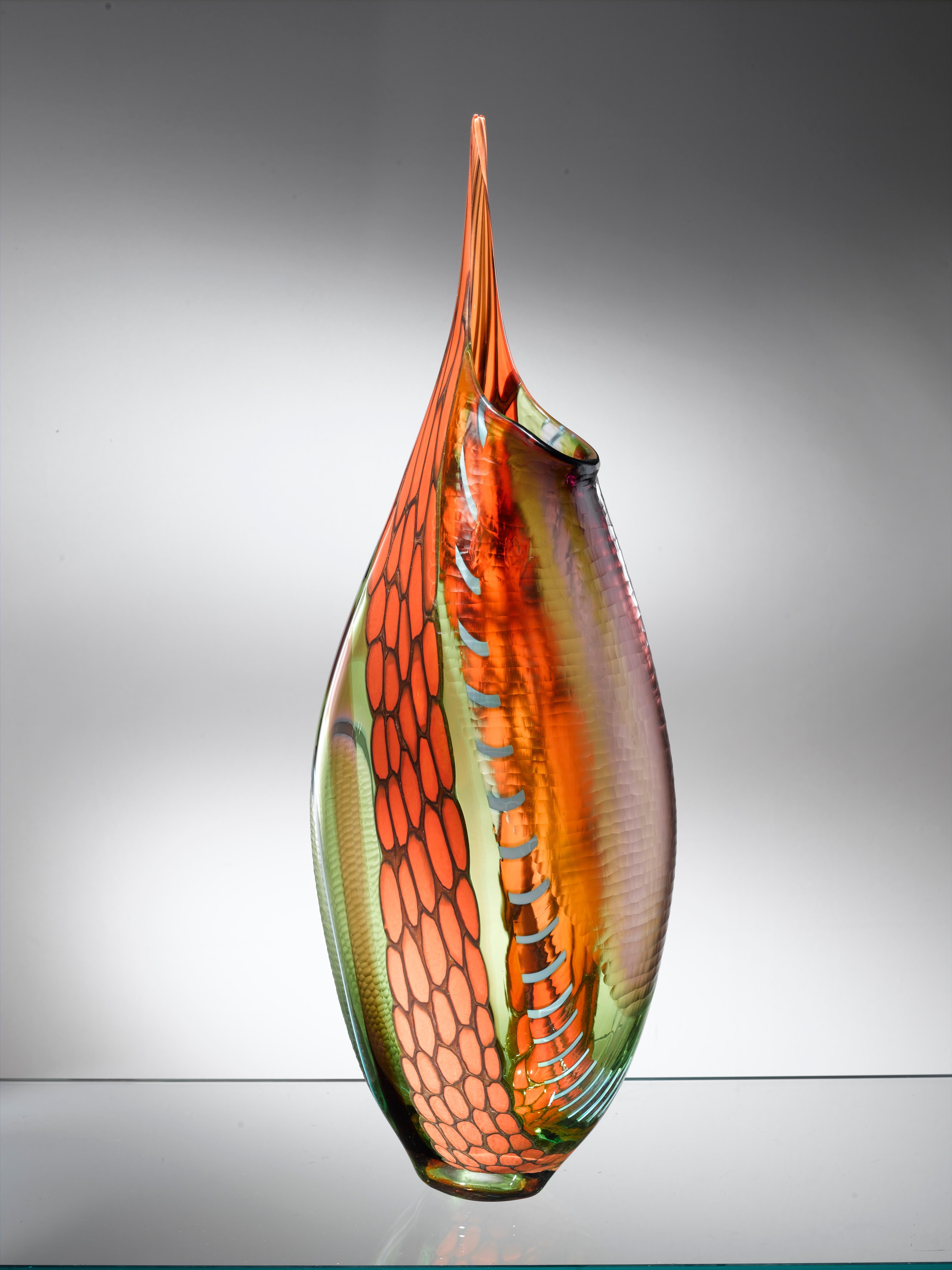 Murano artistic glass. The murano artistic glass sculpture is a creative and natural expression of the artist Eros Raffael, made of murano blown glass by Eros Raffael, in this sculpture they are enclosed in perfect regular shapes: the harmony, and