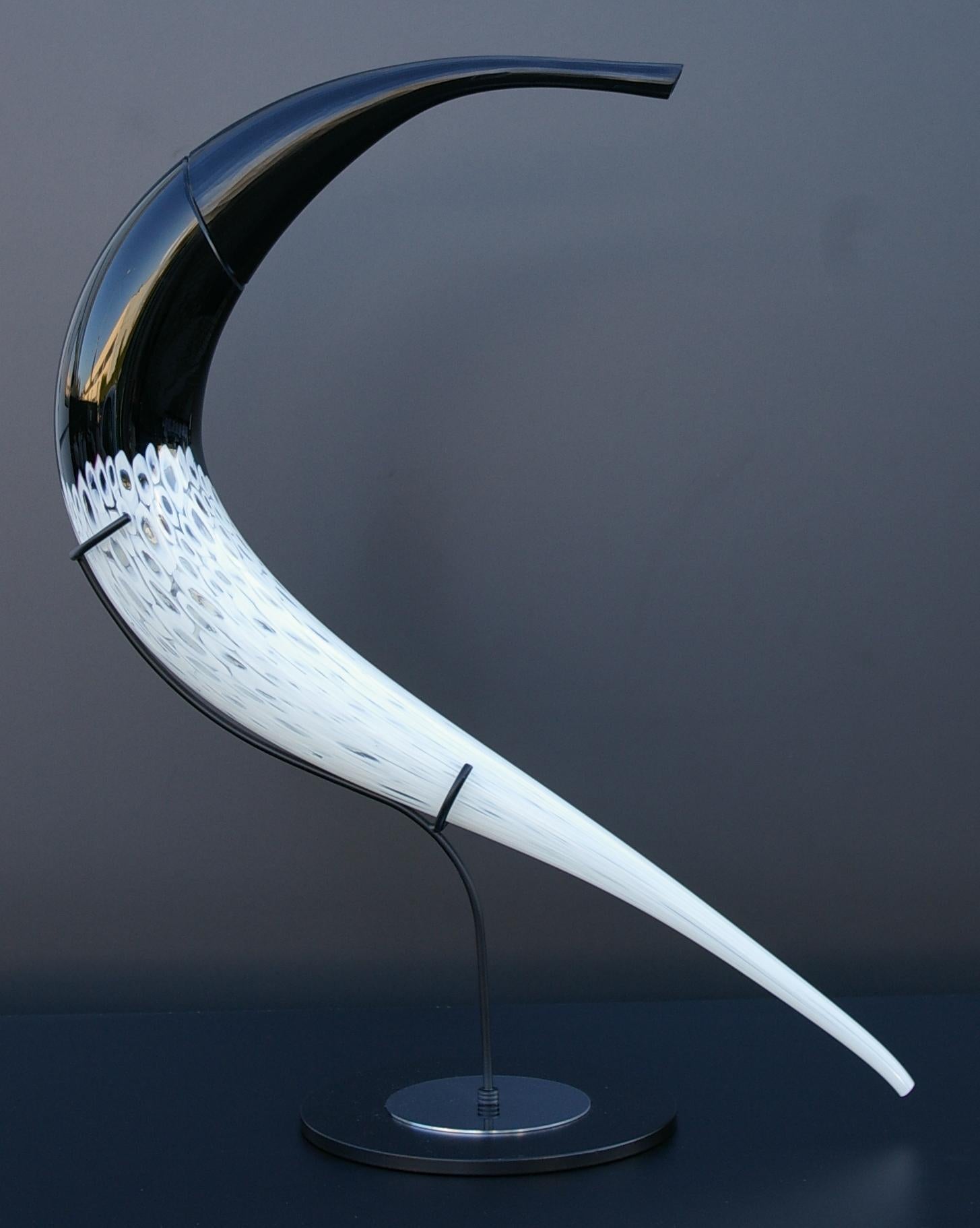 Murano artistic glass. The murano artistic glass sculpture is a creative and natural expression of the artist Eros Raffael, made of Murano blown glass by Eros Raffael, in this sculpture they are enclosed in perfect regular shapes: the harmony, and
