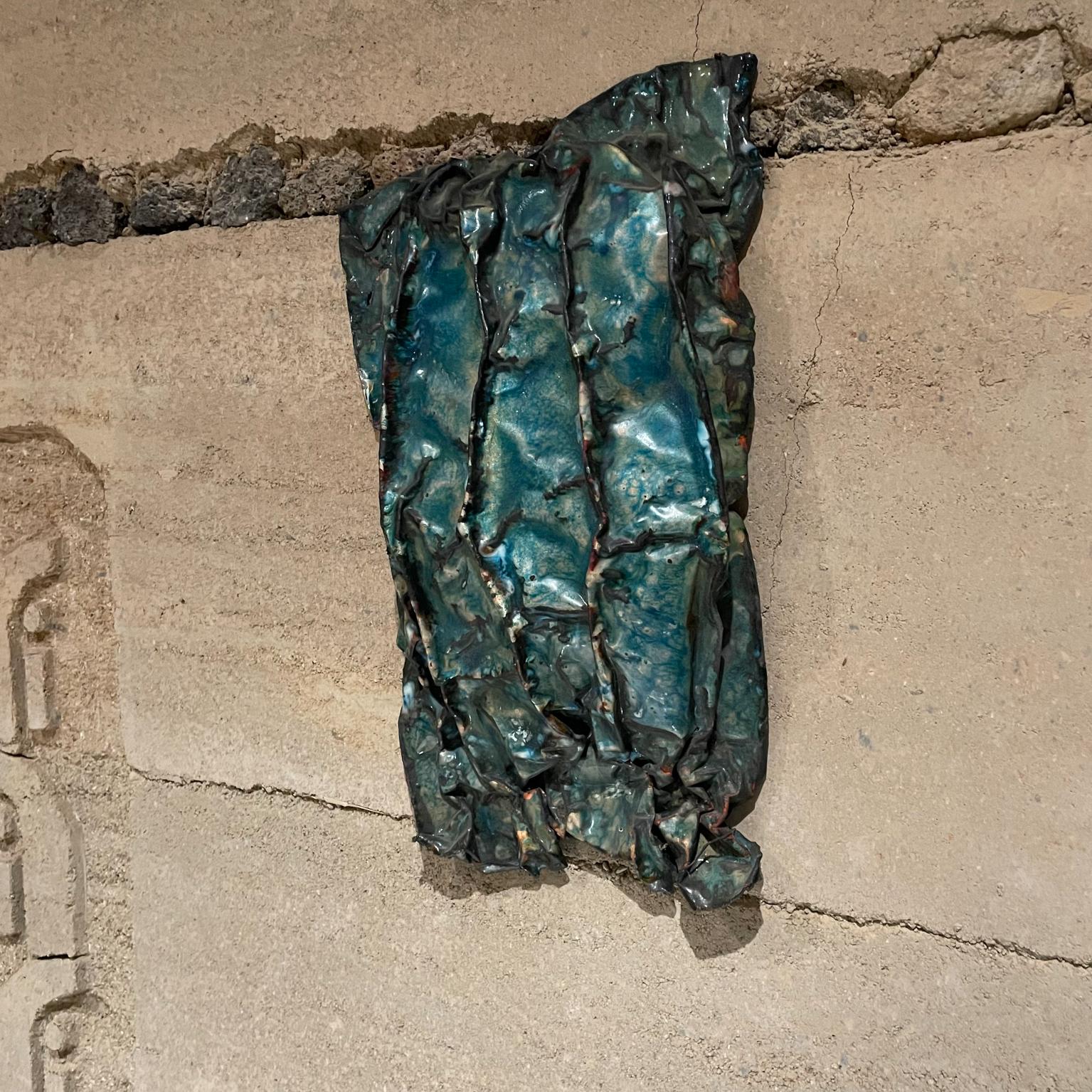 Wall Sculpture
1970s Abstract Sea Sculpture Enamel on Copper in Aqua Green by Joann Tanzer San Diego, California
Title: A View of the Sea  
In the artistic style of Aldo Chaparro tortured expressionism
14.5 W x 3.5 D x 21.5 tall
Original unrestored