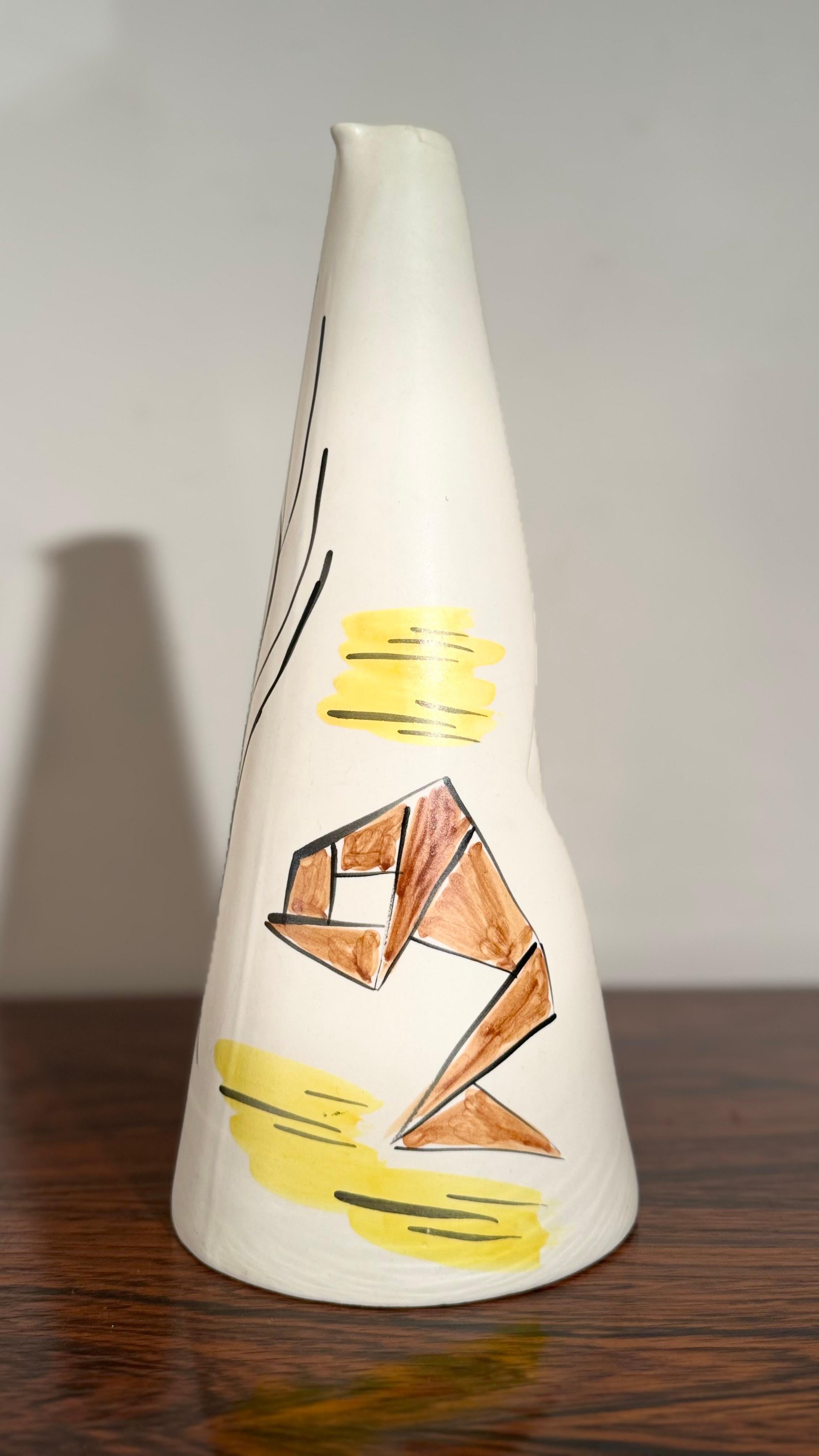 Handcrafted set of six jugs and a pitcher featured with six different position figures in a striking yellow and orange. An abstract style of the Vallauris region, famous for its unique pottery and vibrant glazes all adorned perfect for adding a