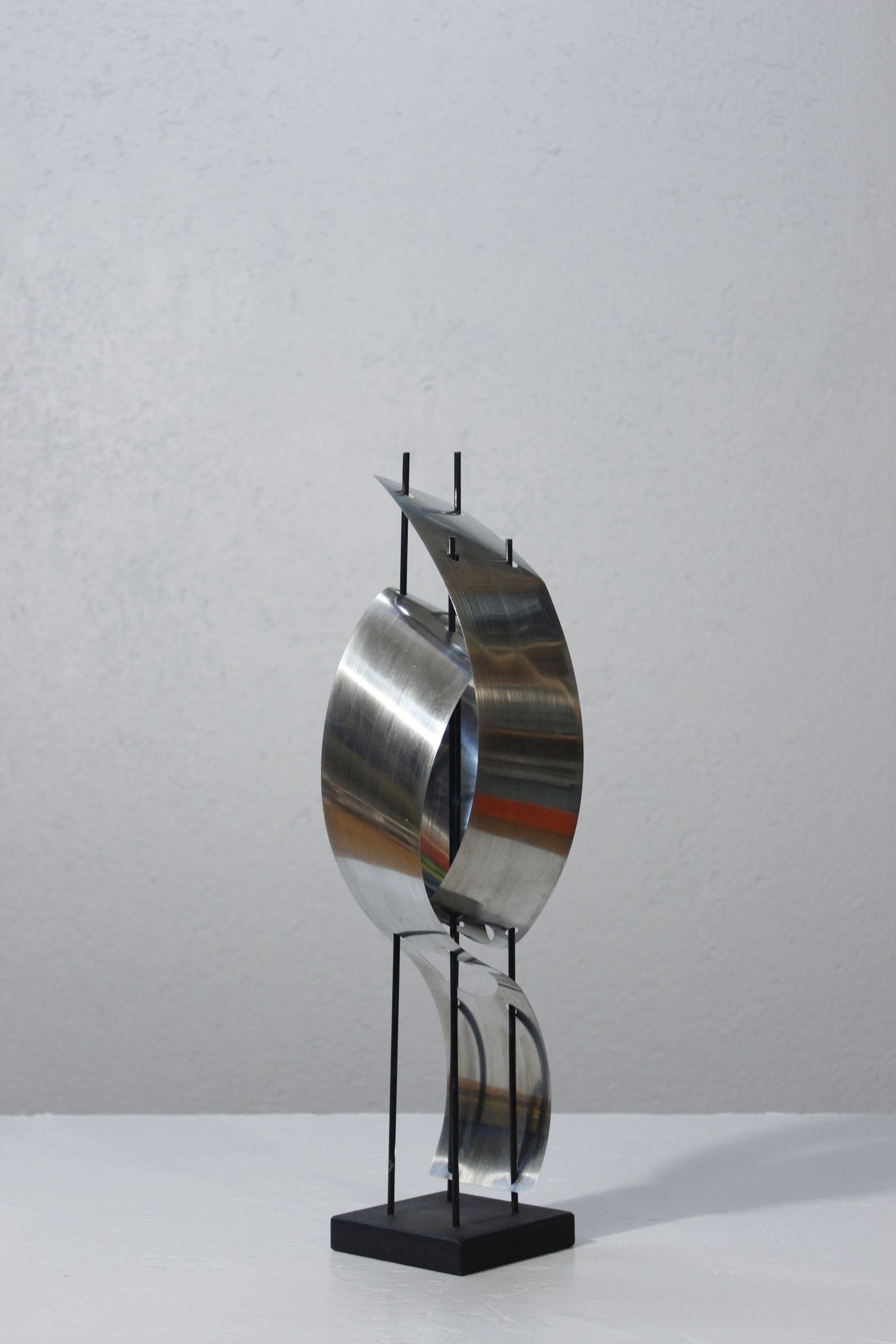 French Abstract space Age sculpture in sheet metal on wooden base, France 1970s For Sale