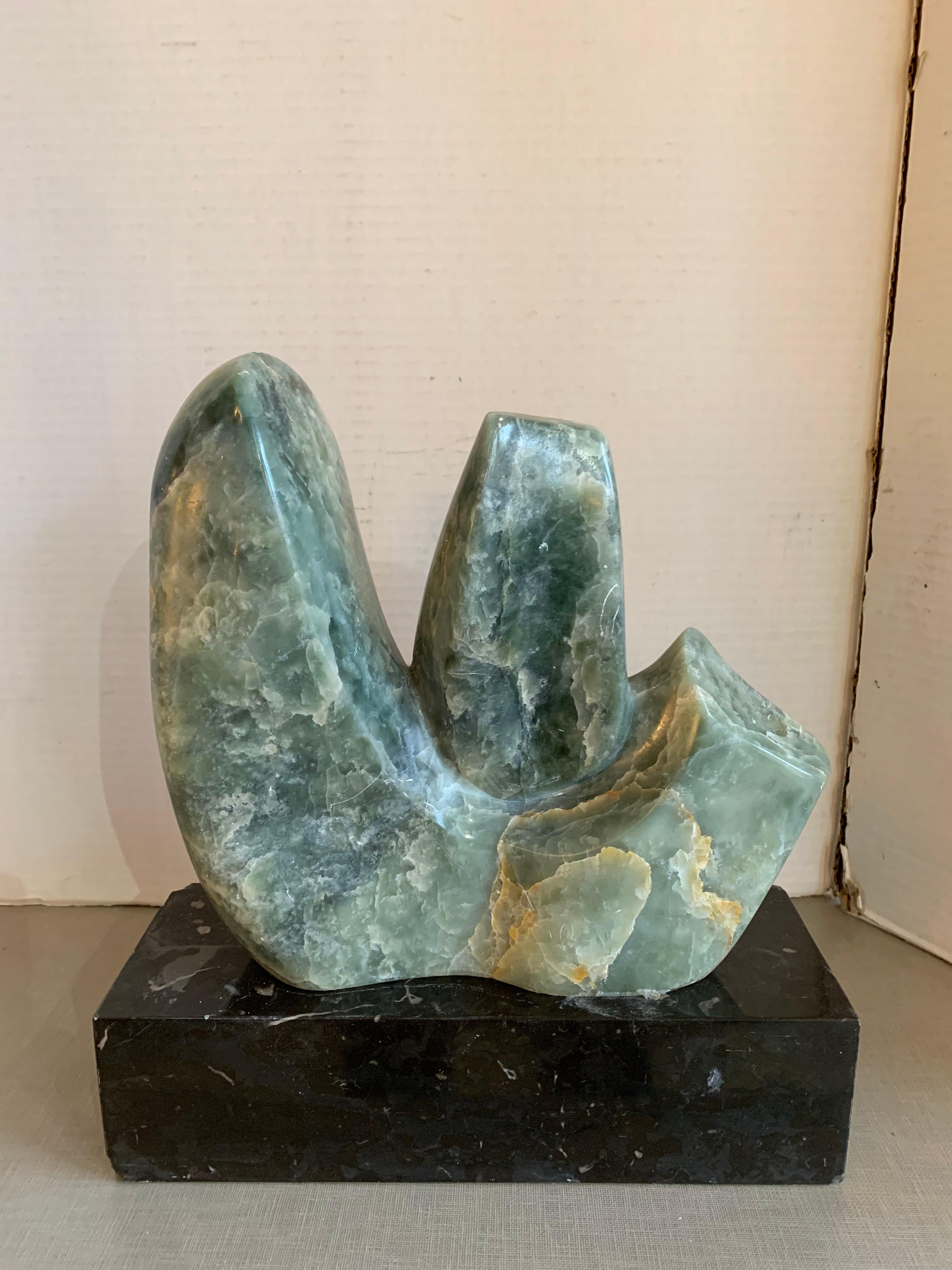 This is a abstract stone and marble sculpture from the 1970s by A. Schmetter.