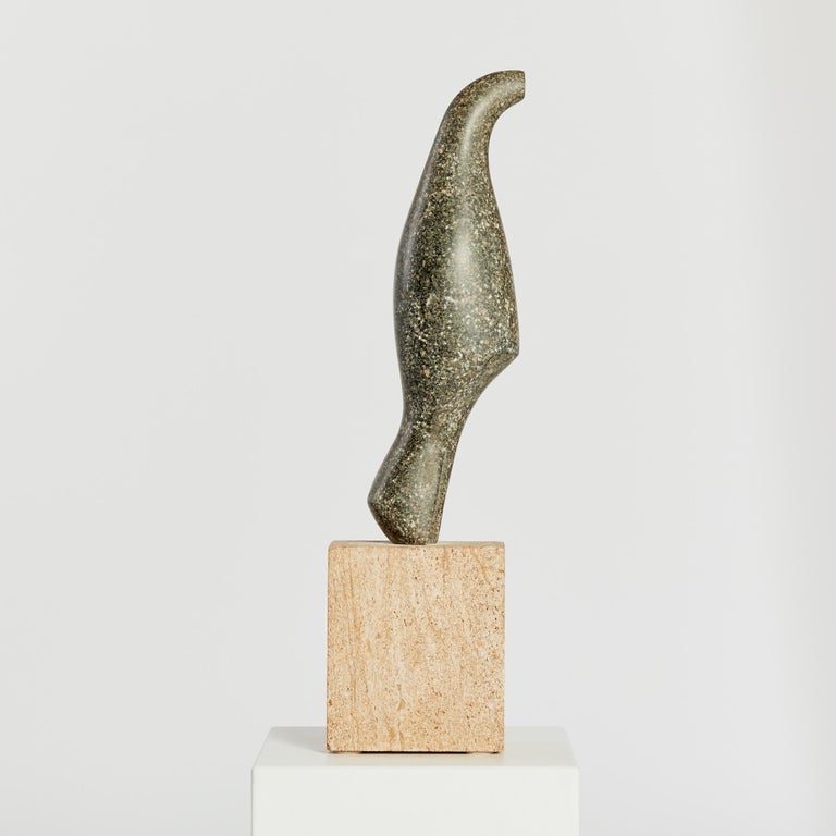 An impressive 65cm in height, this abstract bird sculpture is carved from a speckled granite and is mounted on a contrasting stone base in pale ochre tones.

The bird is in impeccable condition with no scratches, chips or discolouration. The based