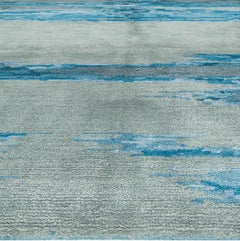 Tappeto "Strié" in acciaio e azzurro "Tidebreak" di Doris Leslie Blau