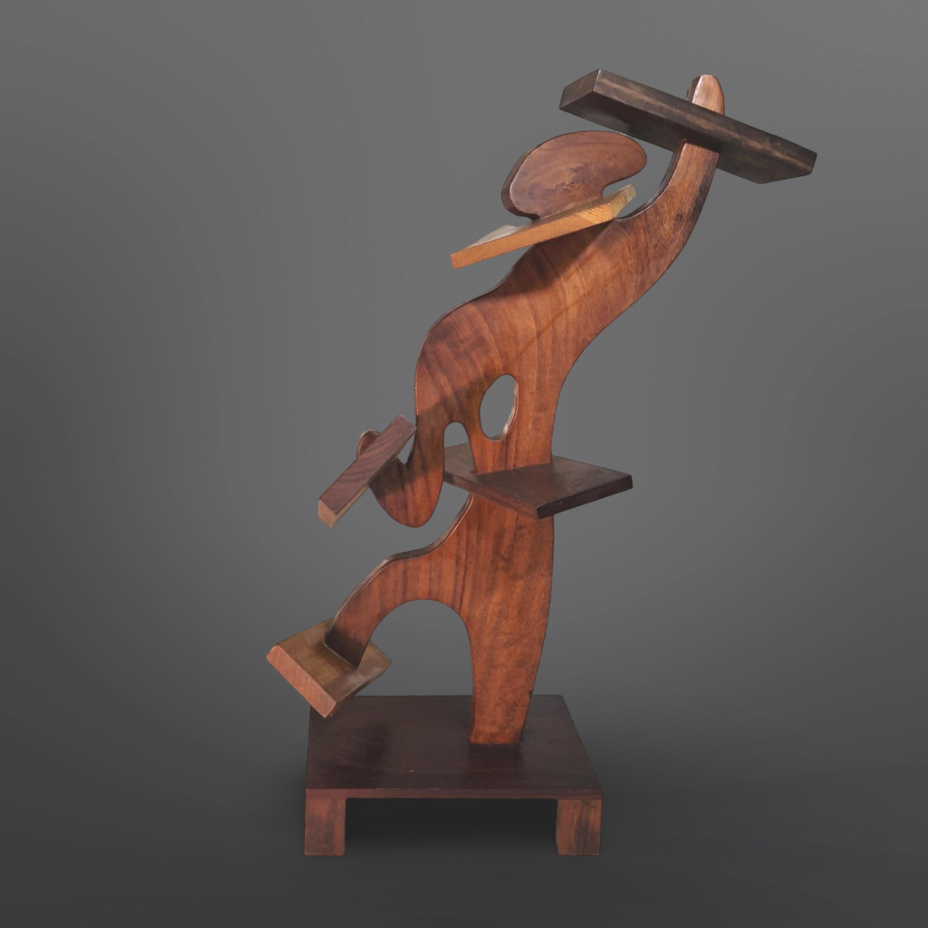 Surrealist abstract sculpture made from different kinds of wood. Created by Dutch visual artist Frederik Weerkamp. This sculpture was part of his personal collection. 
It depicts a person that is going through several wooden planks or