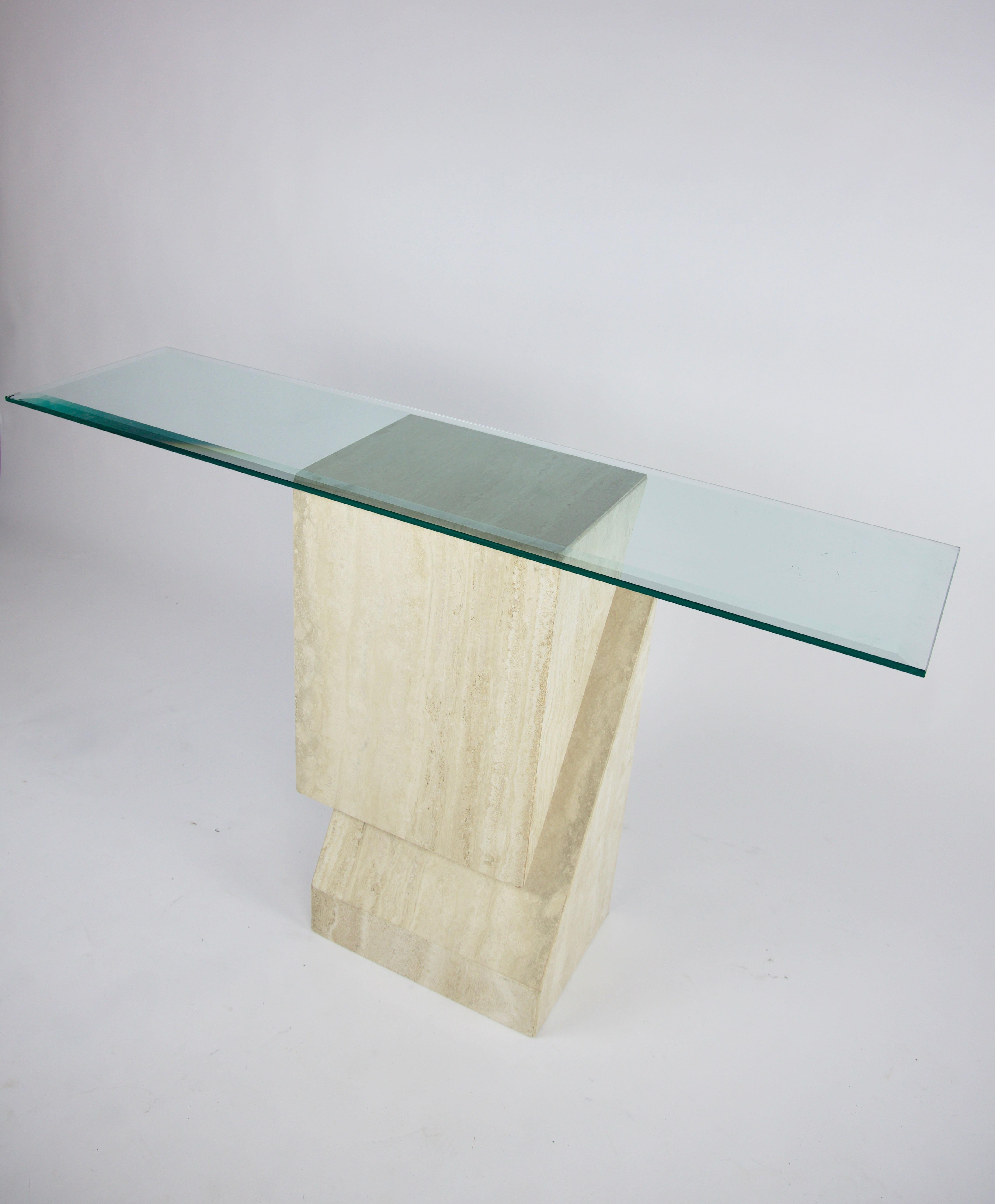 Abstract Travertine table base or pedestal attributed to Up&Up
Looks like 2, three dimensional abstract Travertine triangles interlocking.
Solid Travertine
Can be used as a pedestal or a table base.
 