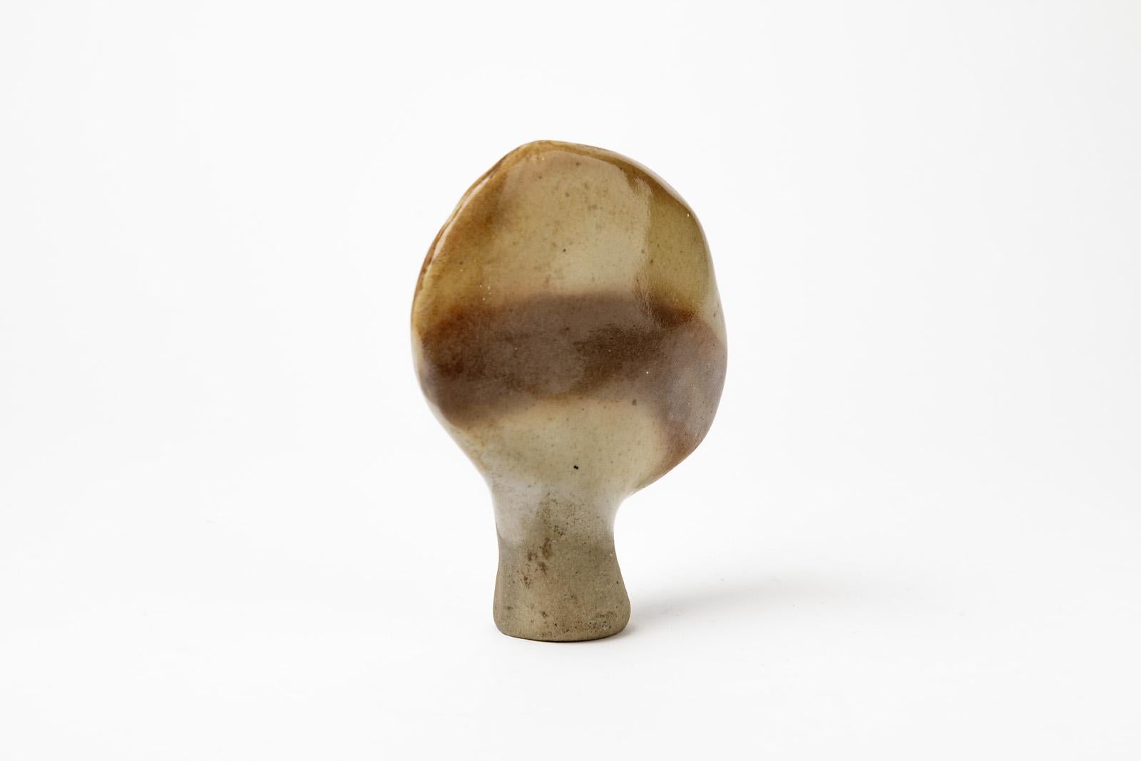 Abstract ceramic form with brown pottery glaze, circa 1970.

Elegant colors.

Realized in La Borne.

Excellent original condition.

Dimension: 16 x 14 x 5 cm.

 