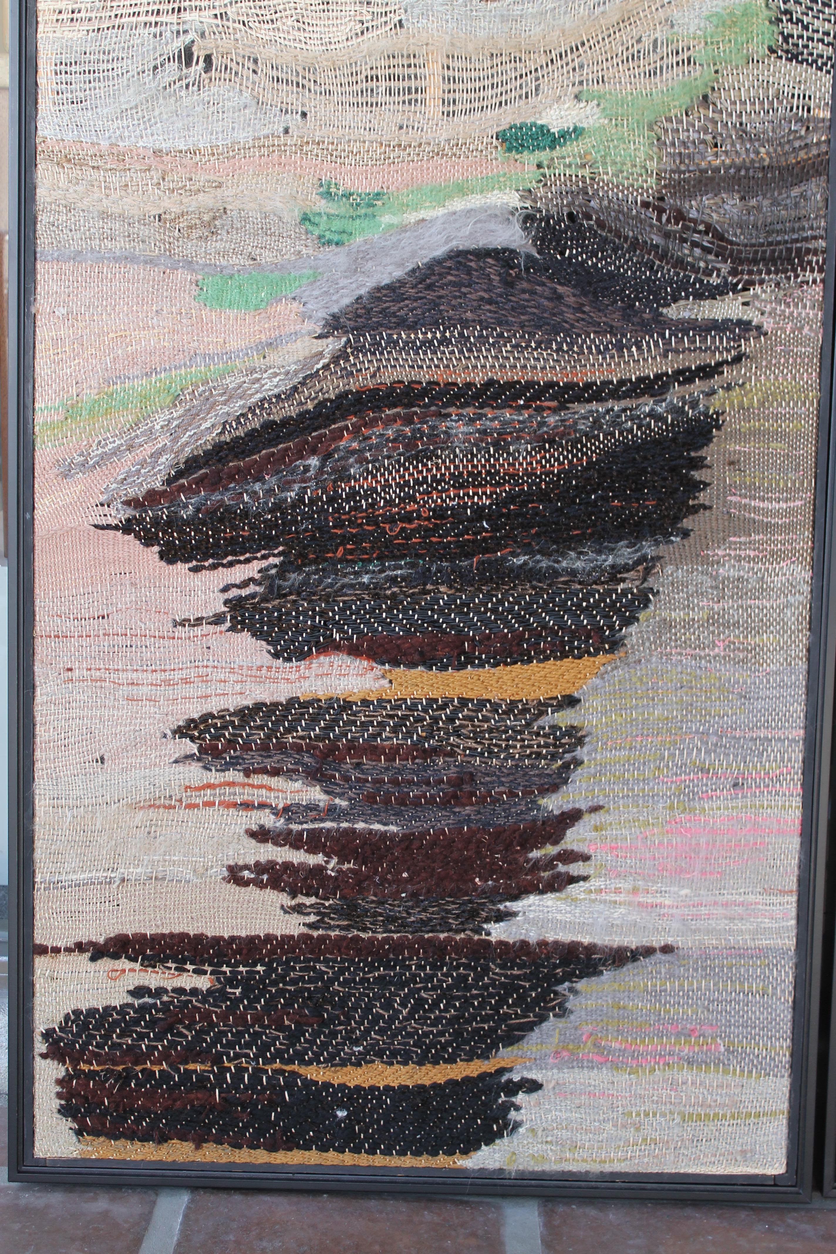 Three large framed abstract weavings. Each have black paper backings and measure 29