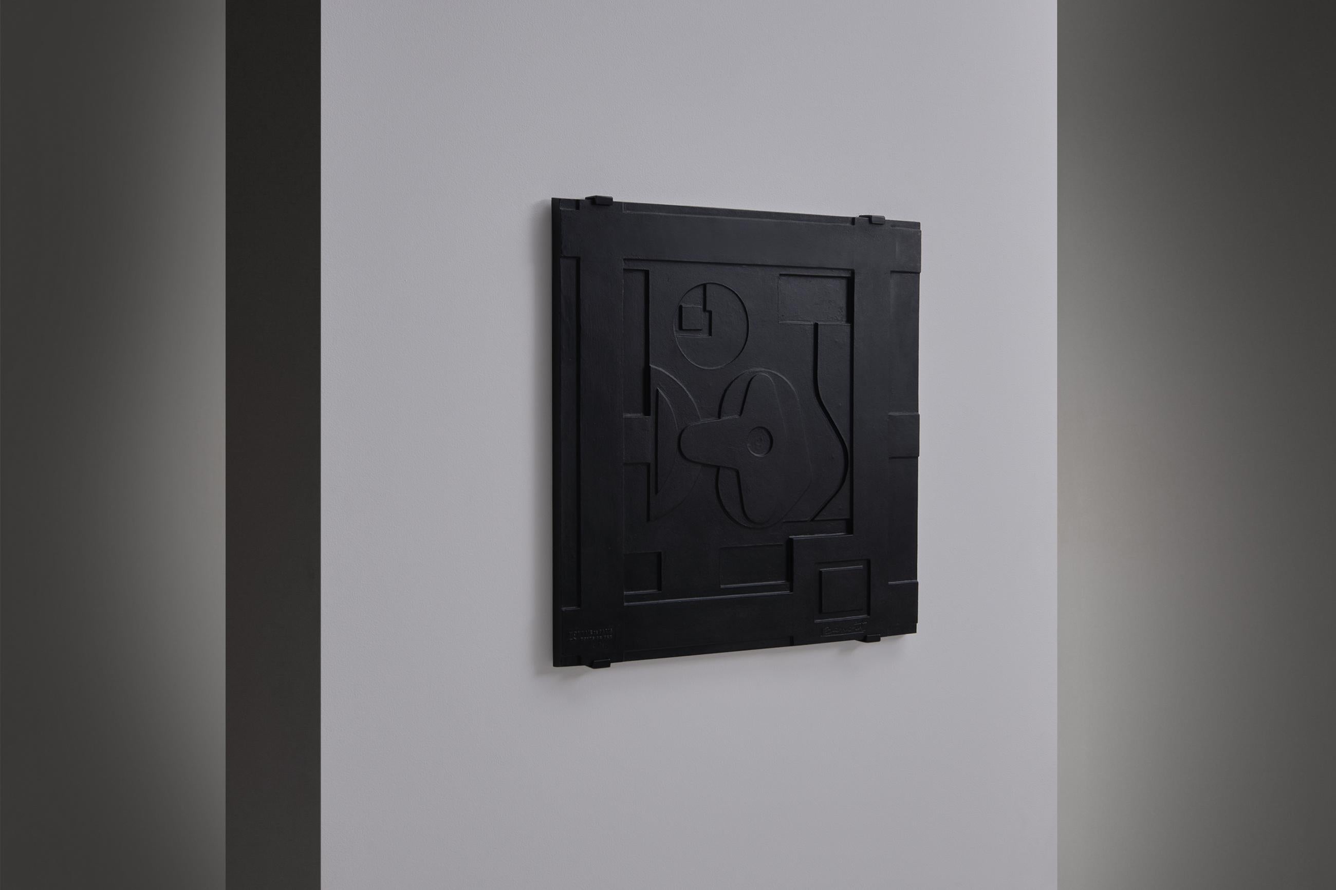 Stunning abstract wall relief, France, 1960's. The artwork is made from cast iron with beautiful abstract shapes reminiscent of the drawings of Le Corbusier. Stamped with: Monnaie de Paris, number 2/50 Signed by the artist 'Benoit'. The work comes