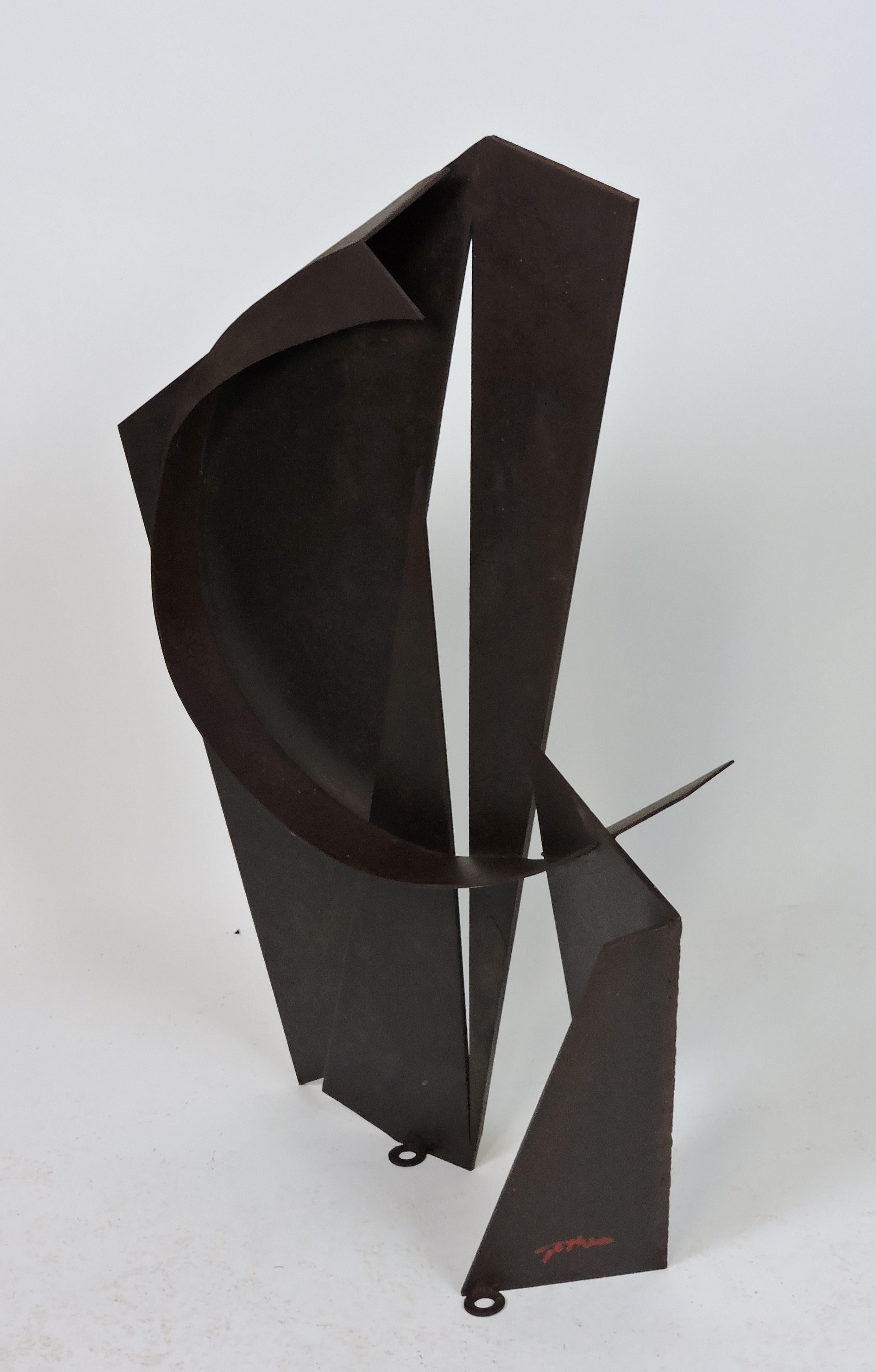 Large welded steel sculpture by Philadelphia based artist David Tothero. This sculpture has strong graphic imagery of curves and angles. The height is 37 inches and it's suitable for both indoor and outdoor display. Signed with the artists signature