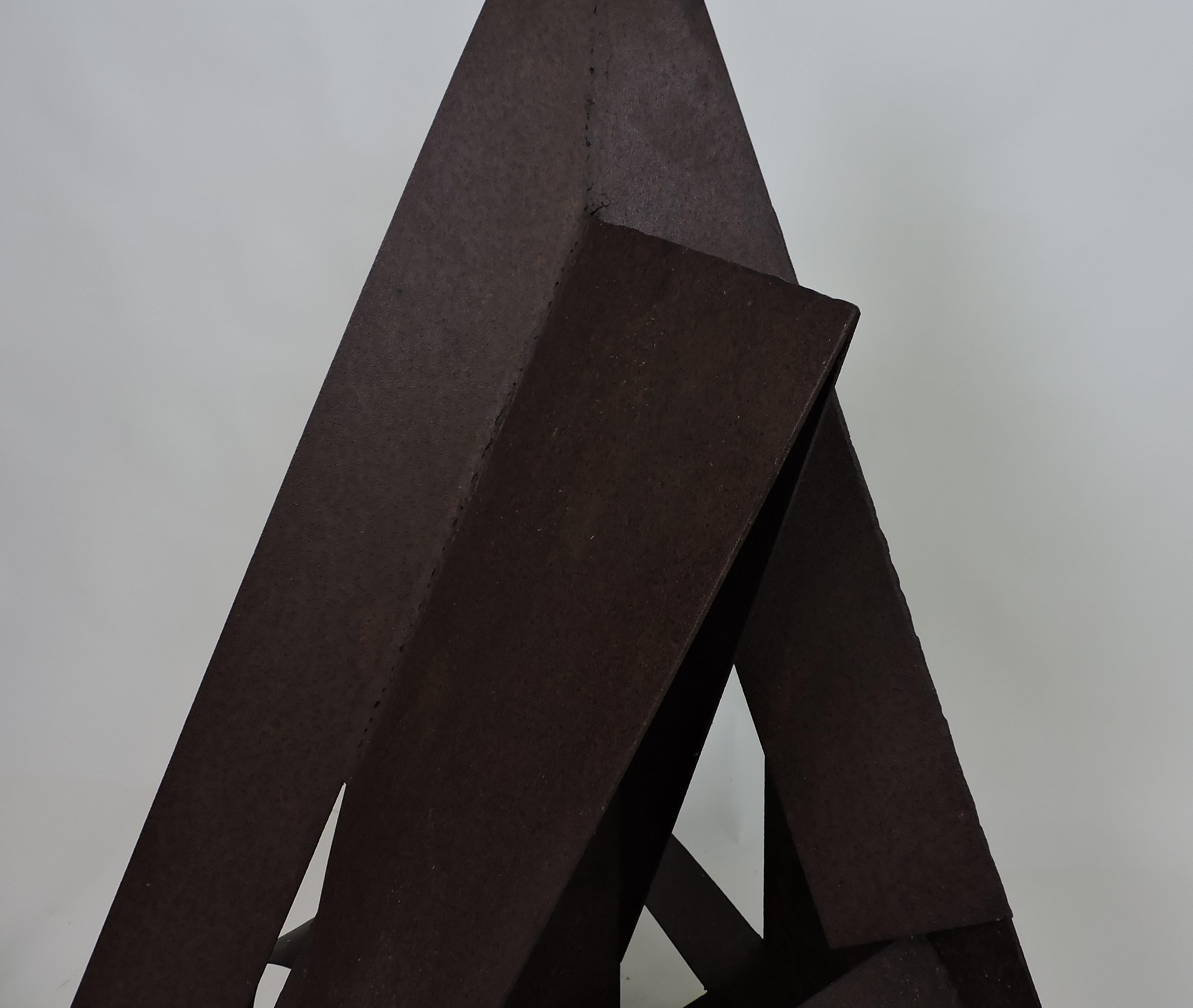 Intricate multi-dimensional Industrial style welded steel sculpture by Philadelphia based artist David Tothero. This piece has strong graphic and textural imagery and is signed by the artist in the lower corner. It's 40 inches high and is suitable