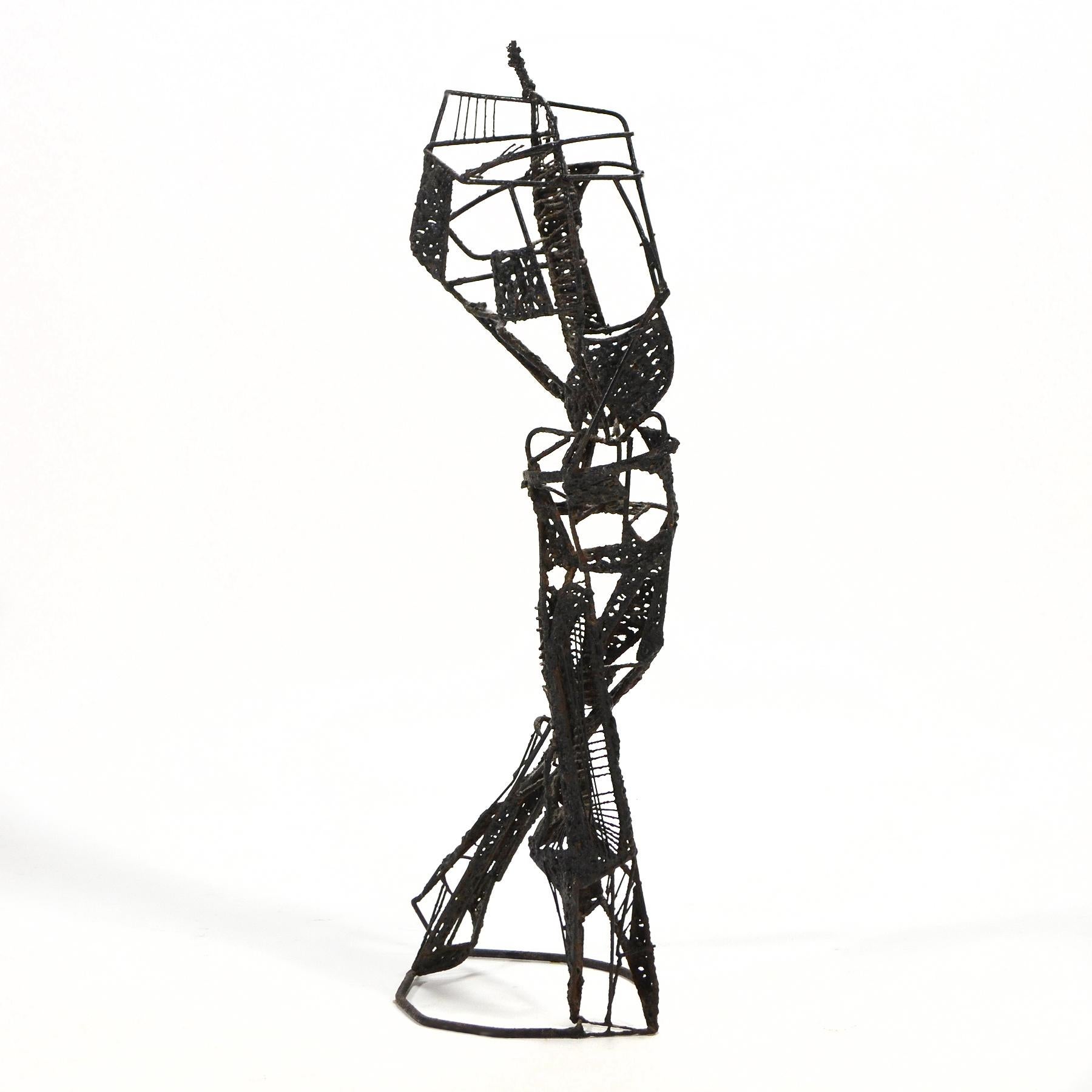 This terrific abstract sculpture conveys both a sense of motion and internal tension. With an edgy linear quality, it is like a drawing which has let into space.