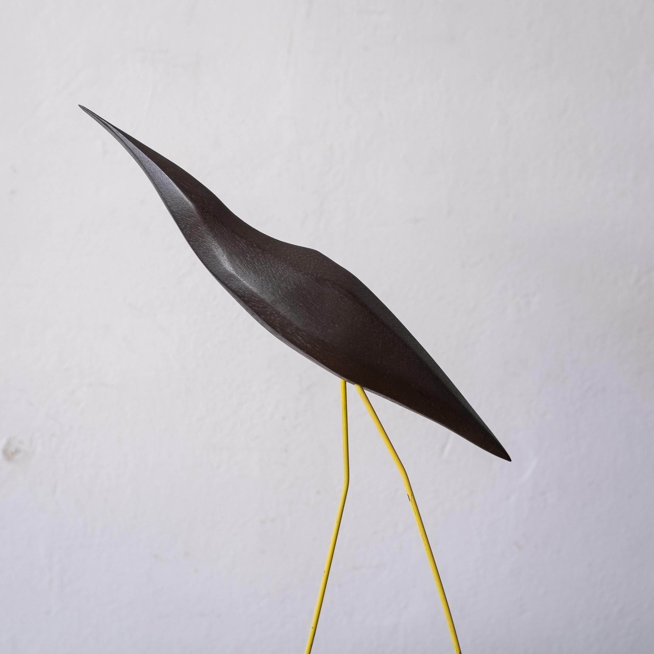 Abstract bird sculpture by artist Val Robbins (1925-2009). Executed at his Rimrock Pennsylvania studio. Wood form on metal legs. The enamel is by his wife Mae Robbins. This was purchased directly from the artist's estate. Signed on the base. USA,