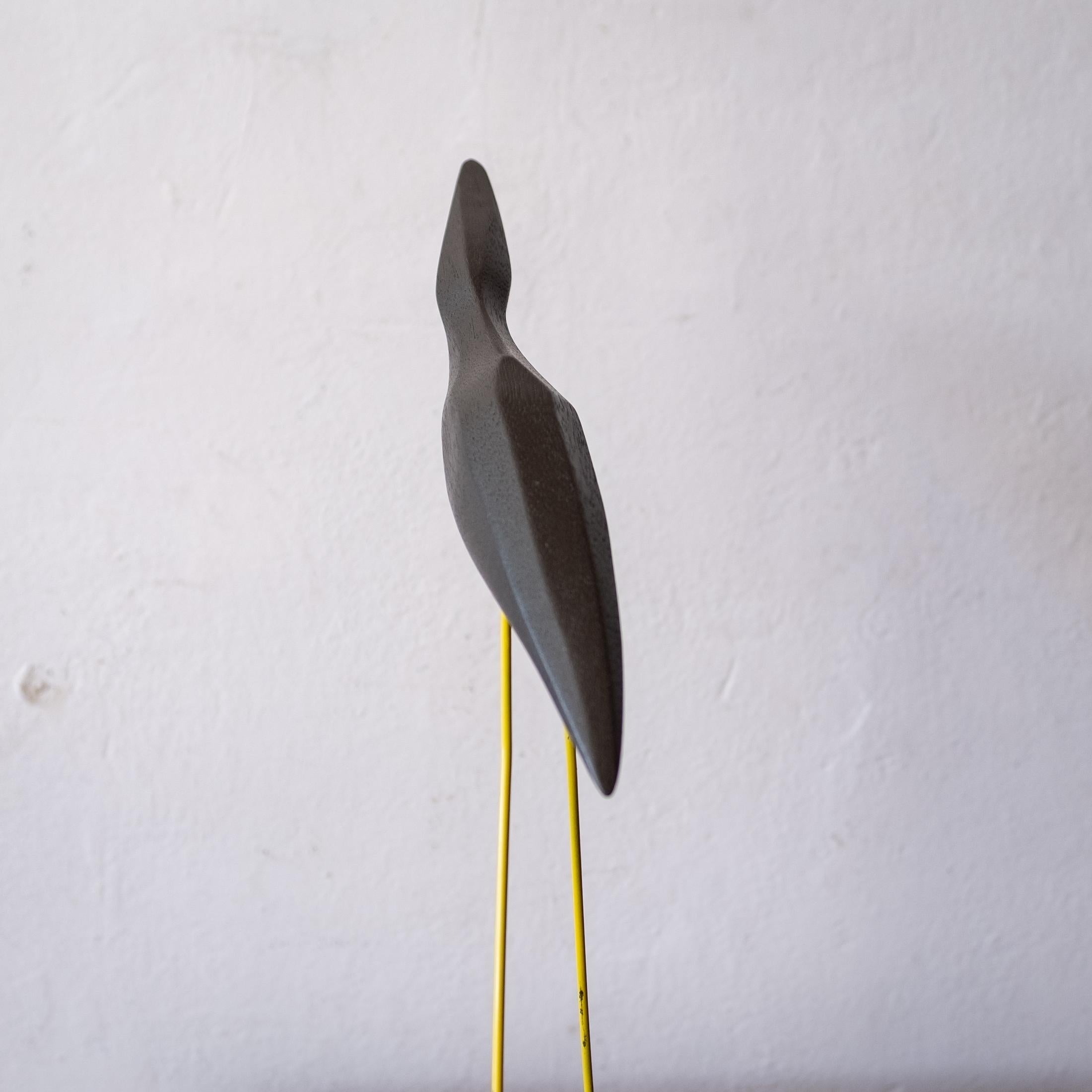 wooden bird sculpture