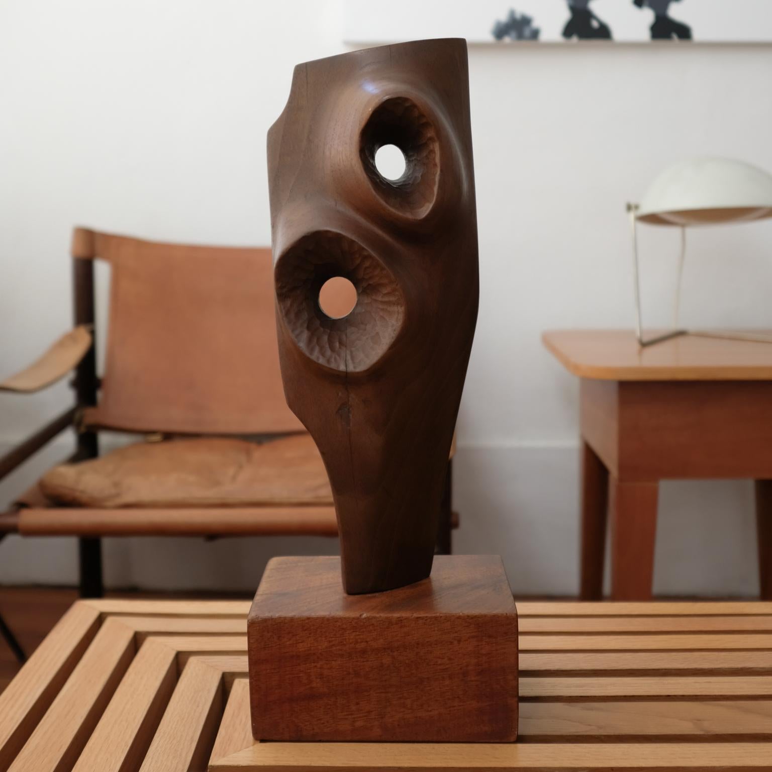 Walnut abstract sculpture with a chip carved design. Mahogany base. Unsigned. 1960s.