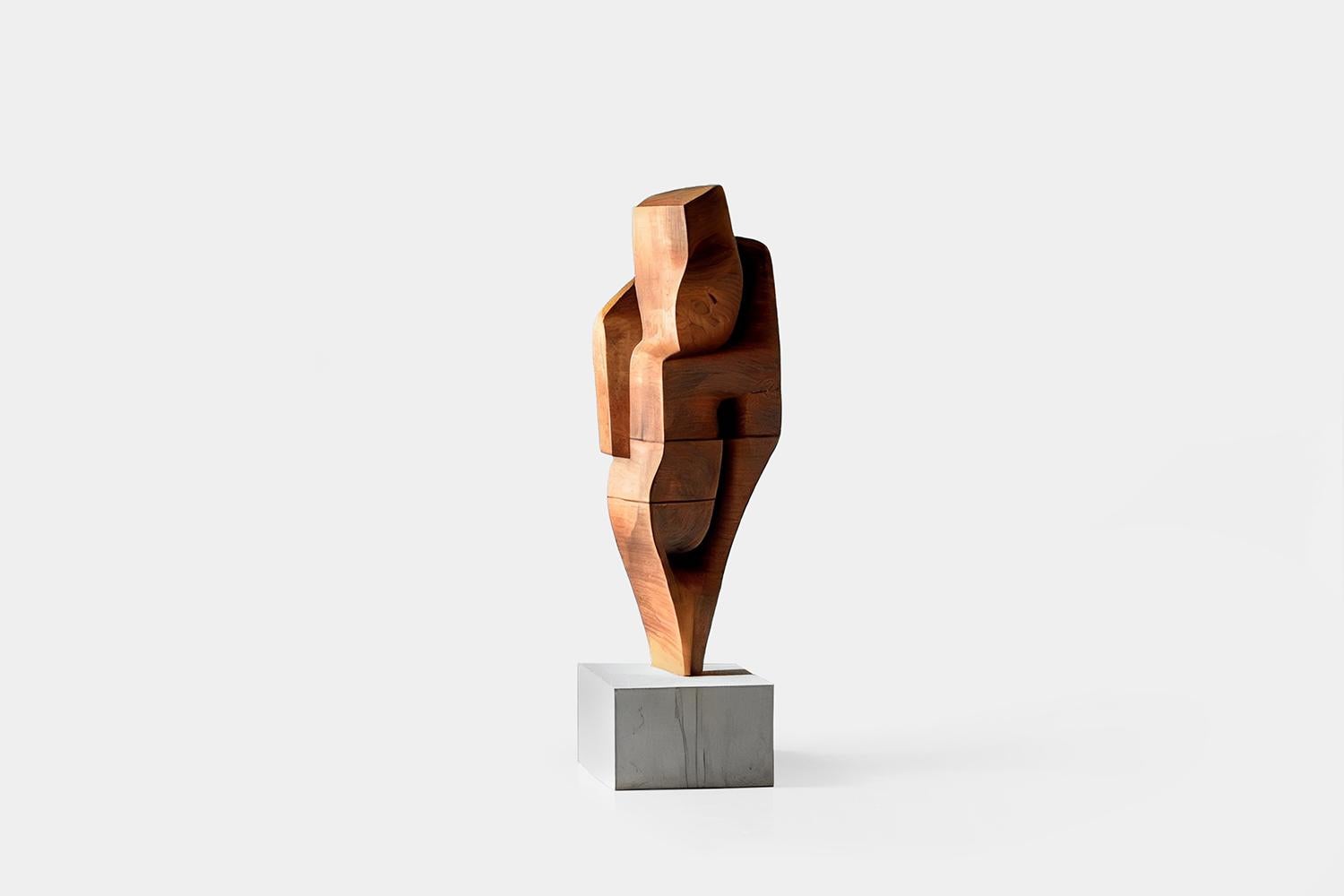Abstract wood sculpture in the Flair of Scandinavian Art, Unseen Force by Joel Escalona.

This monolithic sculpture, designed by the talented Artist Joel Escalona, is a towering example of beauty in craftsmanship. Hand and digital machine made;