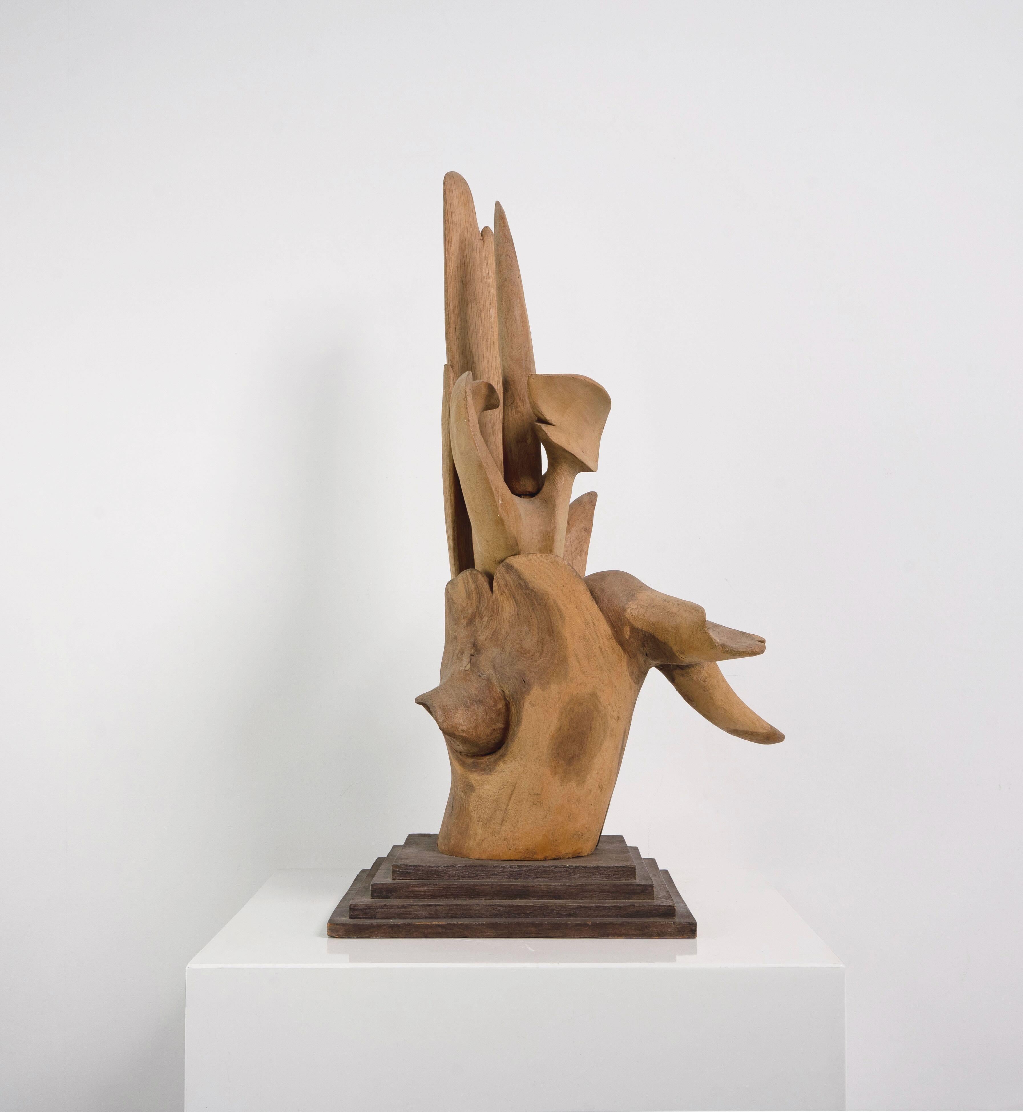 An abstract wooden sculpture attributed to Willi Soukop (1907 - 1995).

Willi Soukop was a sculptor, member of the Royal Academy and early teacher of Elisabeth Frink. Soukop's work is prominently on display at Hull University in front of the