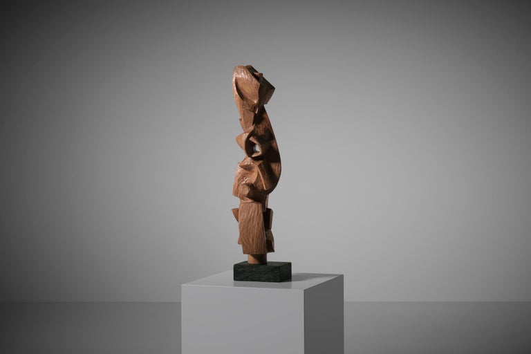 Abstract wooden sculpture by Luigi Nervo (Torino 1930 - 2006), Italy 1974. Nervo began his career as an industrial designer and later started experimenting with different art forms, ultimately discovering his love for wood. This unique sculpture is