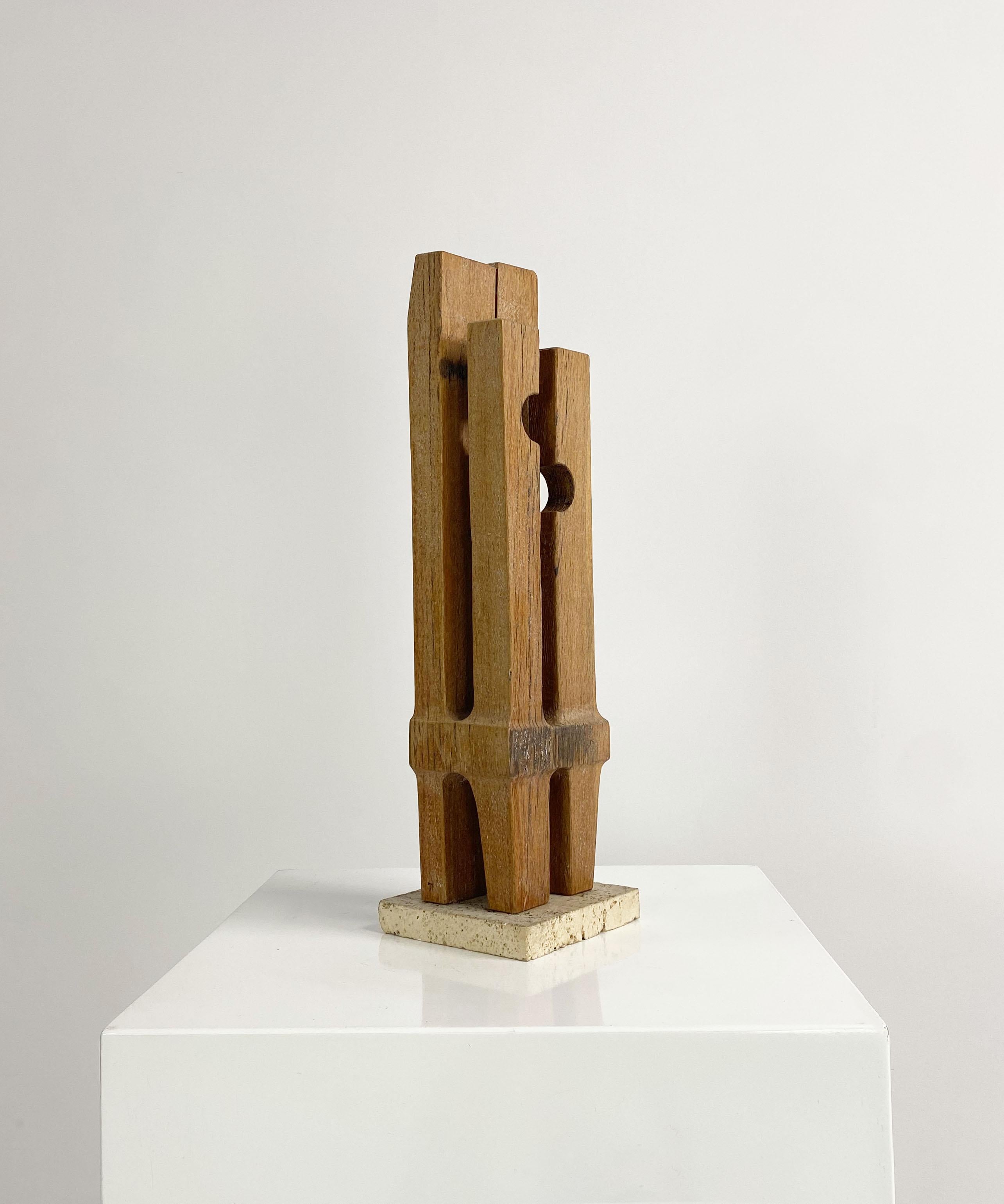 Abstract wooden sculpture by Gloucestershire born sculptor, painter and teacher, Ronald Pope (1920 - 1997). A prize winning stone carver, Pope lectured at the University of Nottingham and engaged in a number of architectural commissions in the