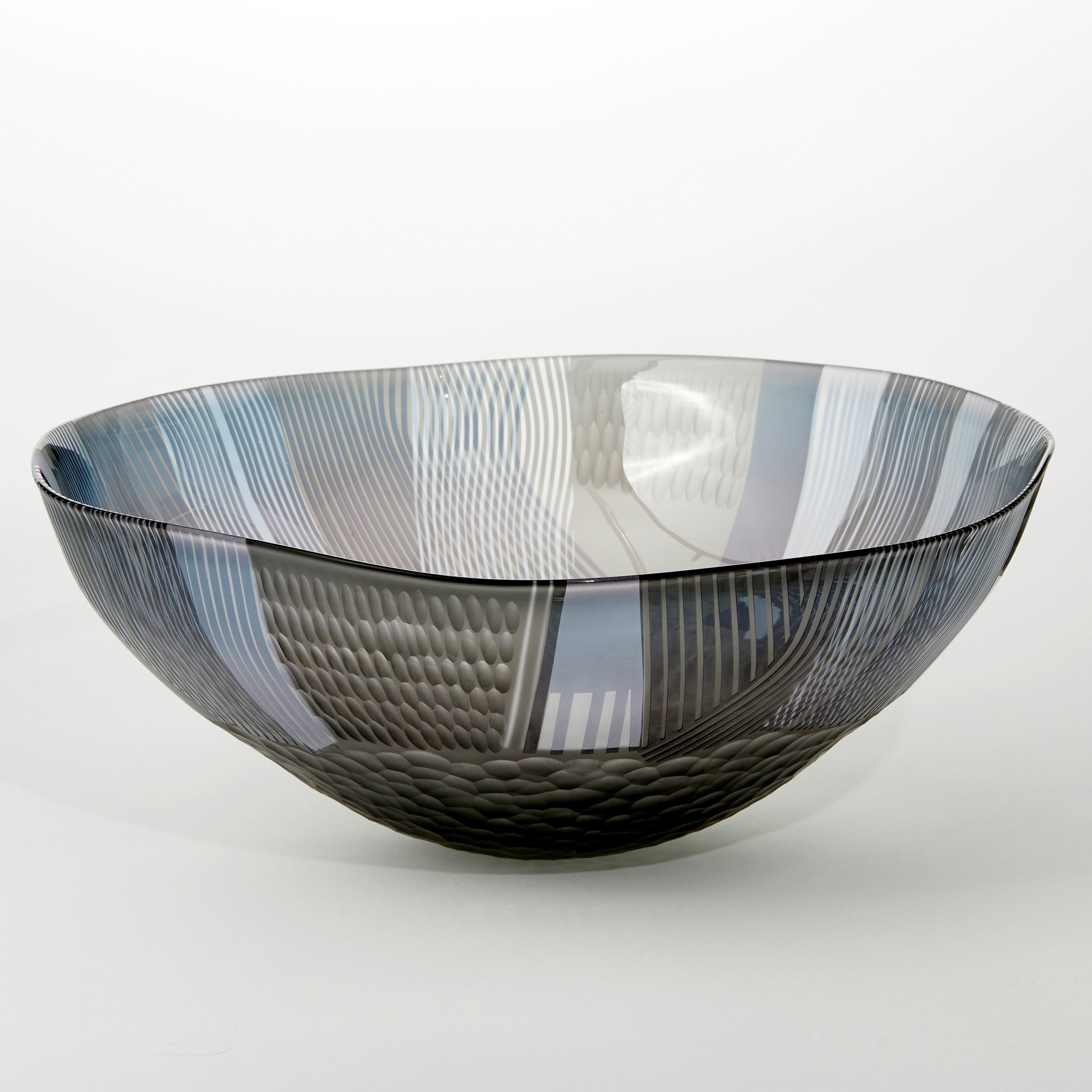 'Abstracted Land Grey Sky over Winter Blue' is a unique handblown and cut glass artwork by the British artist, Kate Jones of Gillies Jones.

In the artist's own words:

“This new body of work references both the evident structure of the landscape