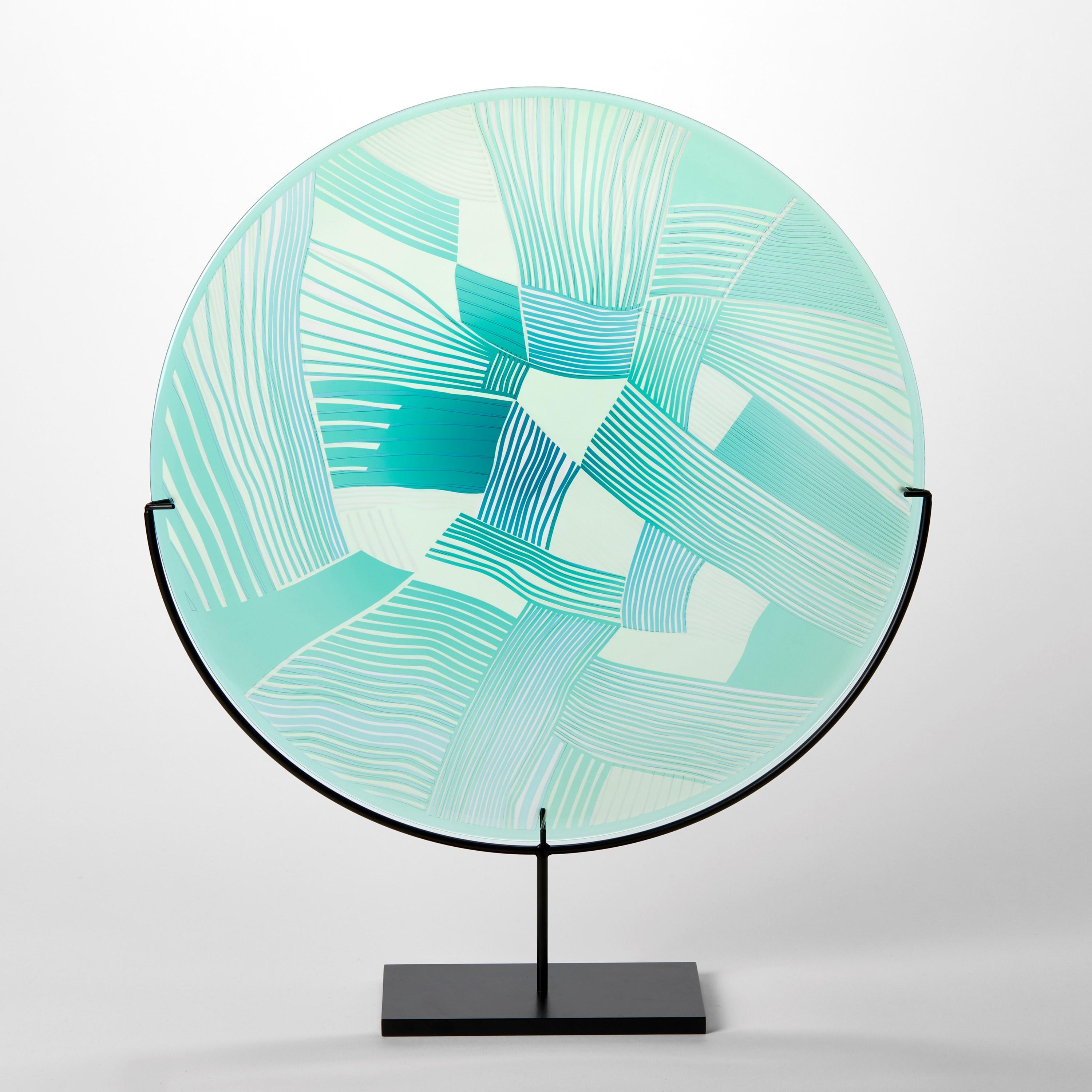 'Abstracted Land Aqua Blue over Grass Green' is a unique handblown and cut glass artwork by the British artist, Kate Jones of Gillies Jones.

In the artist's own words:

“This new body of work references both the evident structure of the landscape