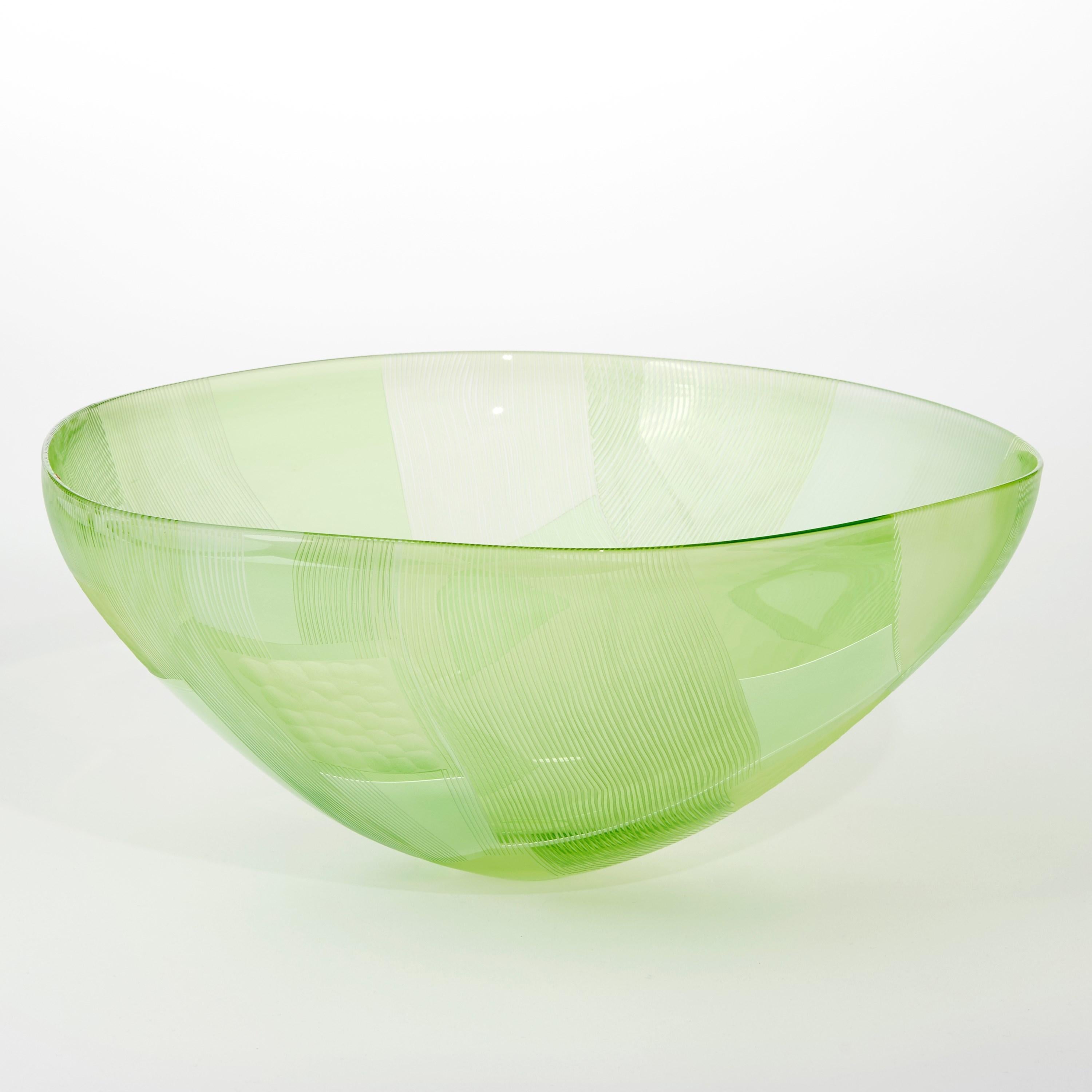 'Abstracted Land Moss Green over Spring Green' is a unique handblown and cut glass artwork by the British artist, Kate Jones of Gillies Jones.

In the artist's own words:

“This new body of work references both the evident structure of the landscape