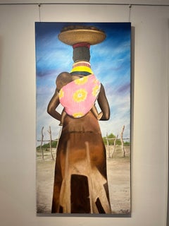 "Mama Africa" a woman carries a baby on her back and a basket on her head, Masai