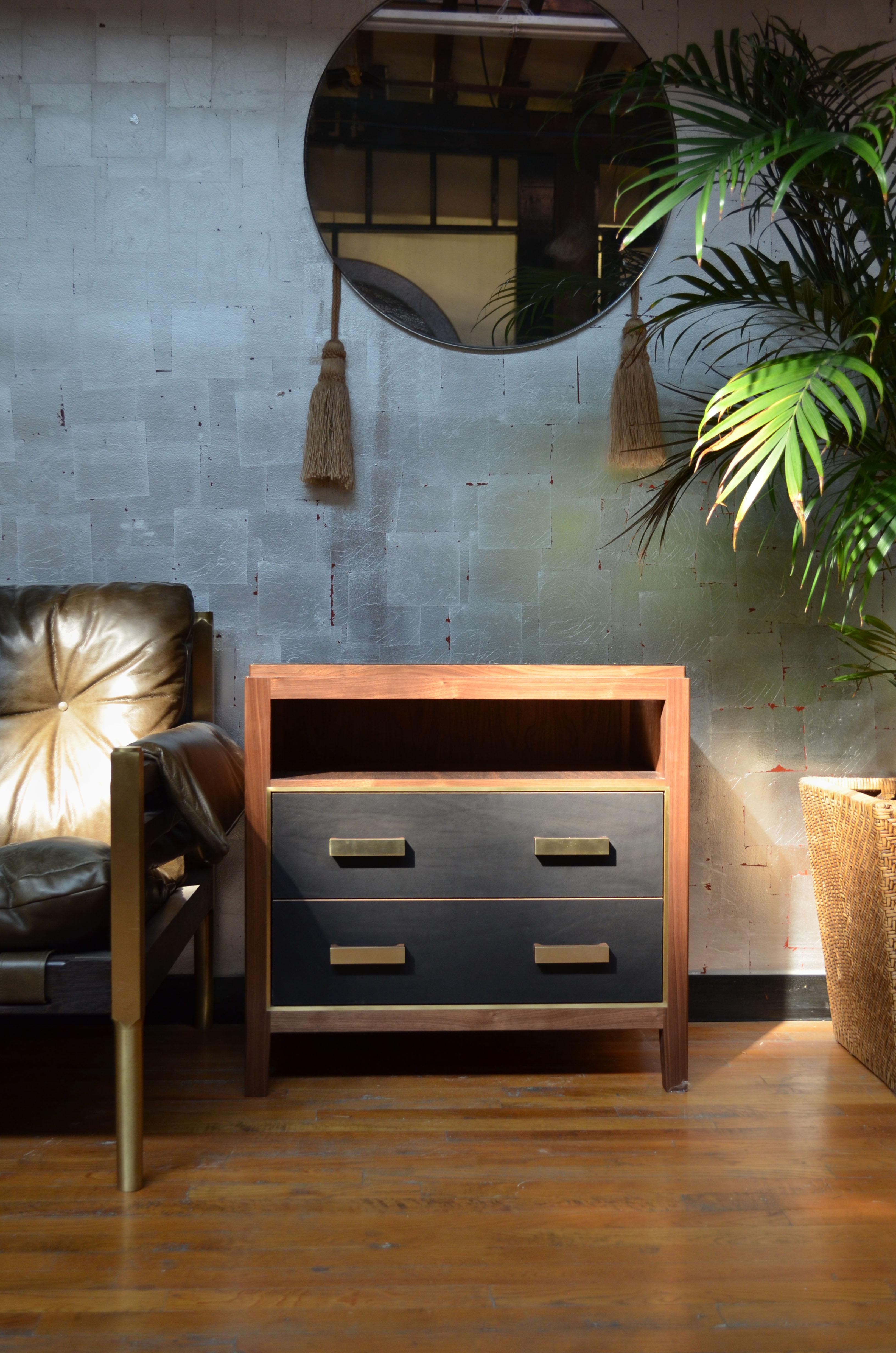 Crafted from rugged saddle leather, the Abuelo collection imitates the streamlined lines of a mid-century piece, while the luxuriousness and richness of its materials create a look all it’s own. Solid walnut-construction houses the brass framing of