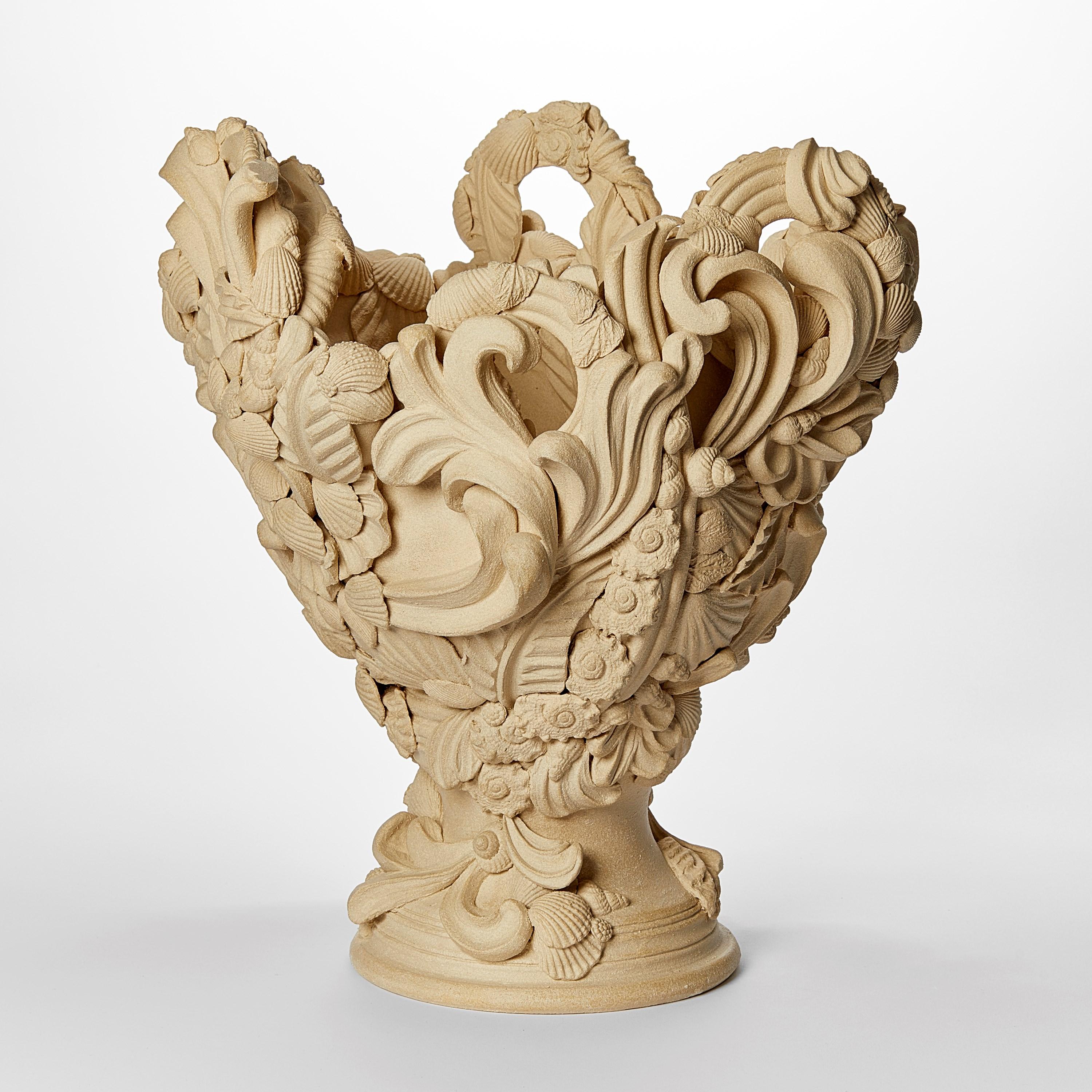 'Abundance I'  is a unique ceramic sculpture by the British artist, Jo Taylor.

Taylor’s inspiration comes from highly decorative architectural features such as ornate plaster ceilings, wrought iron and carved stone. Living near the Georgian city of